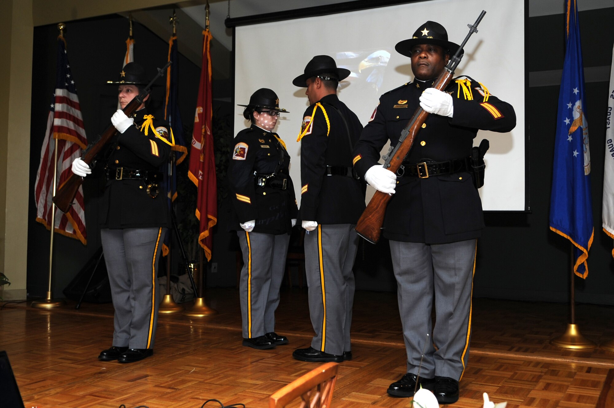 Members of the Wayne County Sheriff’s Department Honor Guard post the Colors during the Purple Heart Banquet at the Walnut Creek Country Club in Goldsboro, N.C., Aug. 10, 2012. Several members of Team Seymour were honored during the evening’s ceremony. (U.S. Air Force photo/Airman 1st Class Aubrey Robinson/Released)