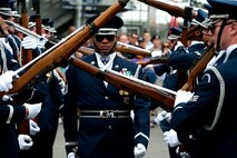 A member of the Air Force Drill Team walks through twirling rifles during a performance at Air Force Week 2012 in New York City on Aug. 19. (U.S. Air Force photo/Senior Airman Andrew Lee) 
