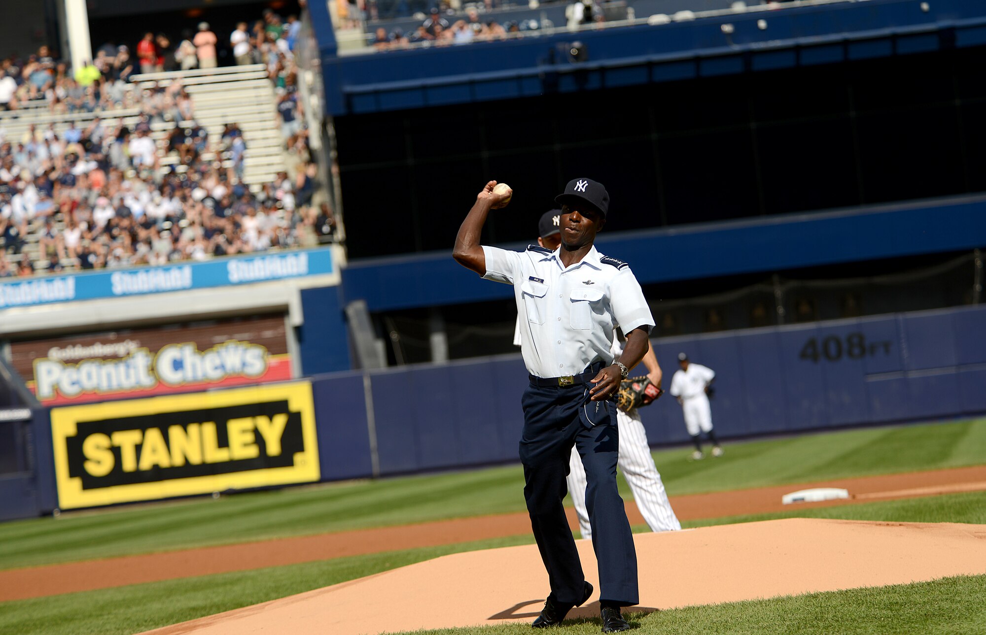 Gen. Edward A. Rice throws out the first pitch at Yankee Stadium before the Yankees vs. Red Socks game during Air Force Week 2012 in New York City on Aug. 18. (U.S. Air Force photo/Master Sgt. Jeremy Lock) 
