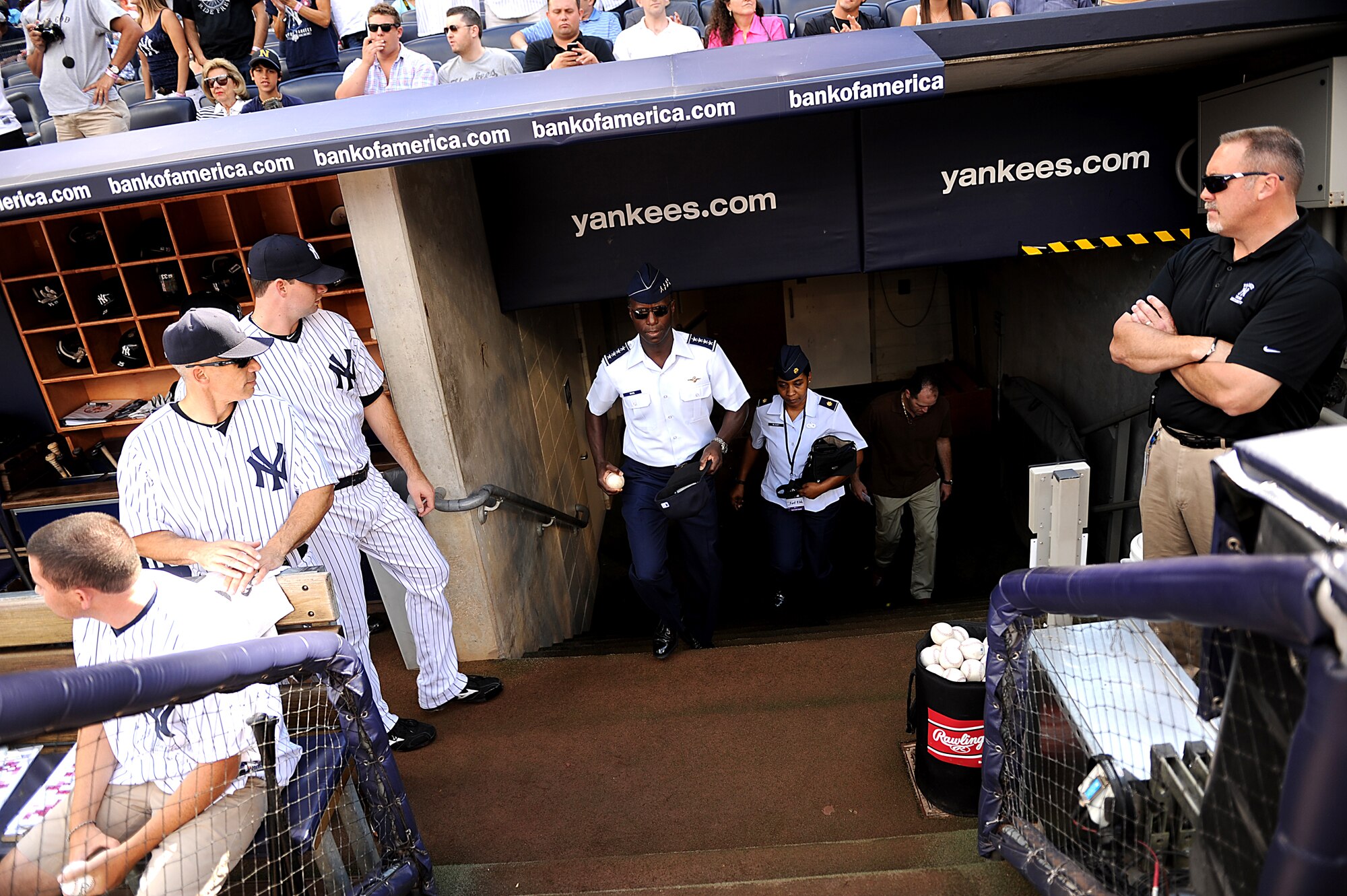 Gen. Edward A. Rice walks out of the Yankee dugout to throw out the first pitch at Yankee Stadium before the Yankees vs. Red Socks game during Air Force Week 2012 in New York City on Aug. 18 2012. (U.S. Air Force photo/Master Sgt. Jeremy Lock) 

