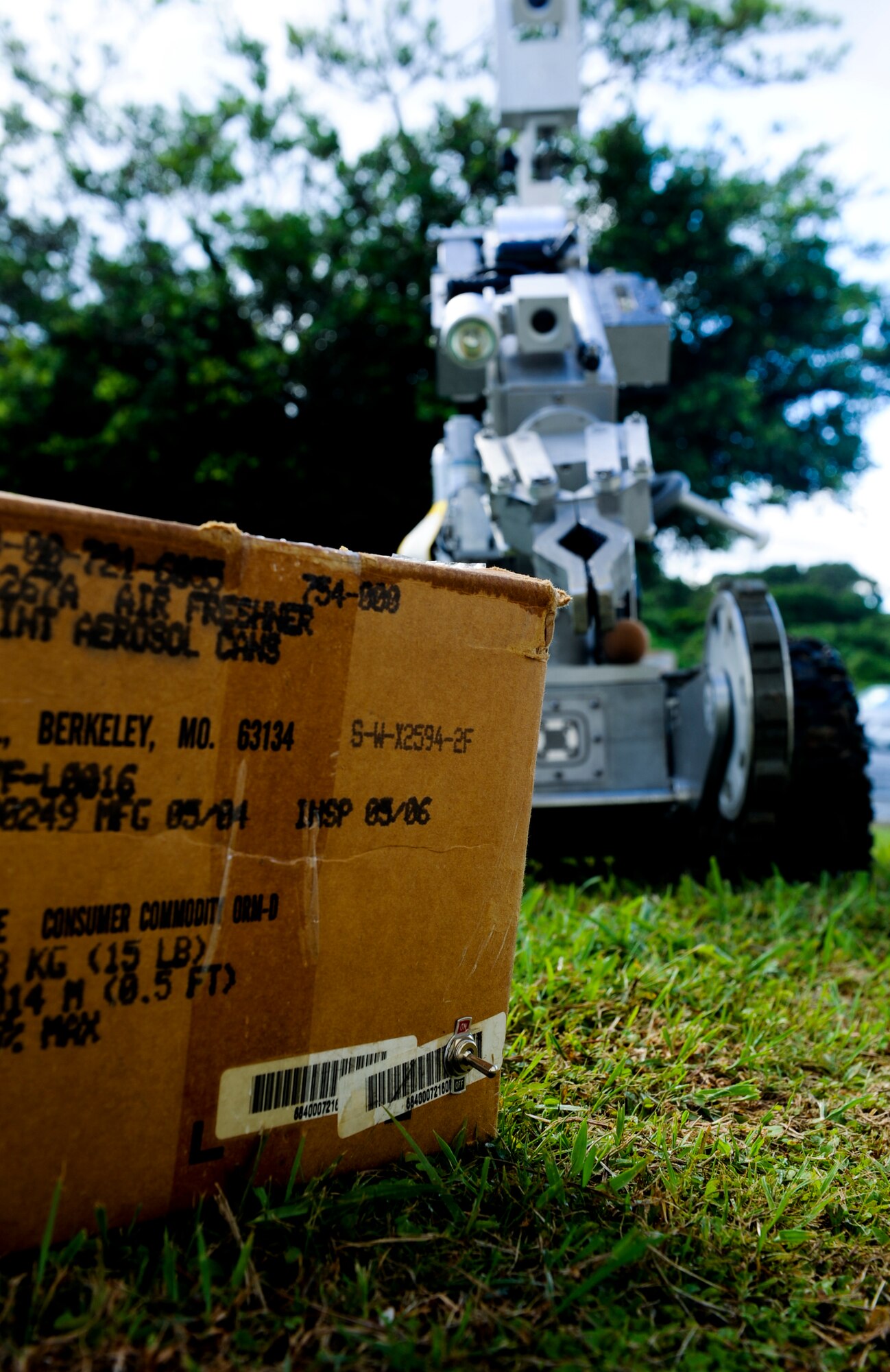 A Remotec ANDROS F-6A robot prepares to assess a bomb in a training scenario during Beverly High 12-5 local operational readiness exercise on Kadena Air Base, Japan, Aug. 20, 2012. The robot is an unmanned remote-controlled robot that is designed to help assure a safe, successful outcome for the explosive ordnance disposal's most challenging missions. (U.S. Air Force photo/Airman 1st Class Justin Veazie)