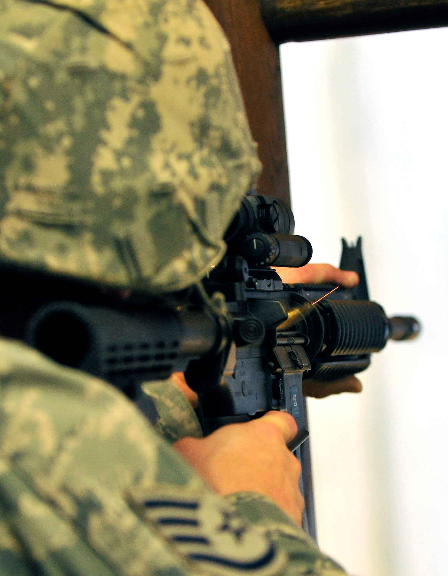 A student goes through the new qualification course, which contains both basic firing positions and advanced tactical movements, at Vogelweh Military Complex, Germany, Aug. 10, 2012.  The 569th Combat Arms Training and Maintenance has 15 assigned instructors and our responsible for the entire Kaiserslautern Military Community area and eight geographical separated units. (U.S. Air Force photo/Senior Airman Chris Willis)
