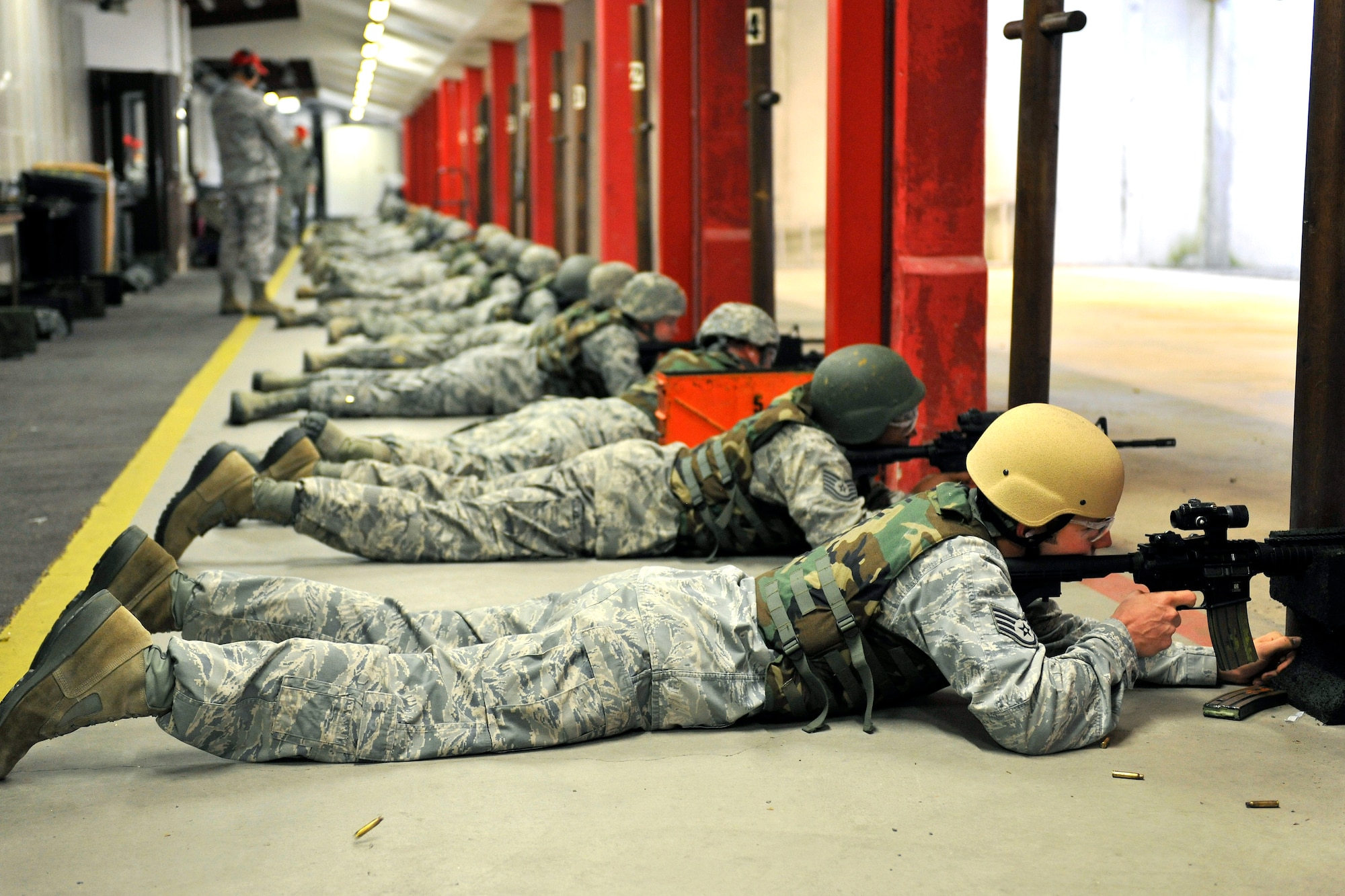 Airmen qualify on the M-4 Carbine using the prone supported position at Vogelweh Military Complex, Germany, Aug. 9, 2012.  The 569th Combat Arms Training and Maintenance has 15 assigned instructors and our responsible for the entire Kaiserslautern Military Community area and eight geographical separated units. (U.S. Air Force photo/Senior Airman Chris Willis)