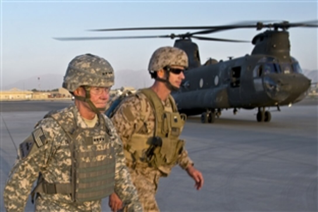 U.S. Army Gen. Martin E. Dempsey, chairman of the Joint Chiefs of Staff, prepares to board a CH-47 helicopter at Kabul International Airport, Afghanistan, Aug. 20, 2012.