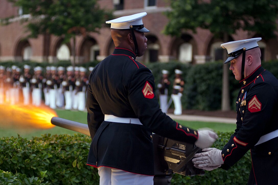 Company B Marines fire ceremonial cannons during a ceremony for the Brigadier General Select Orientation Course Aug. 20.