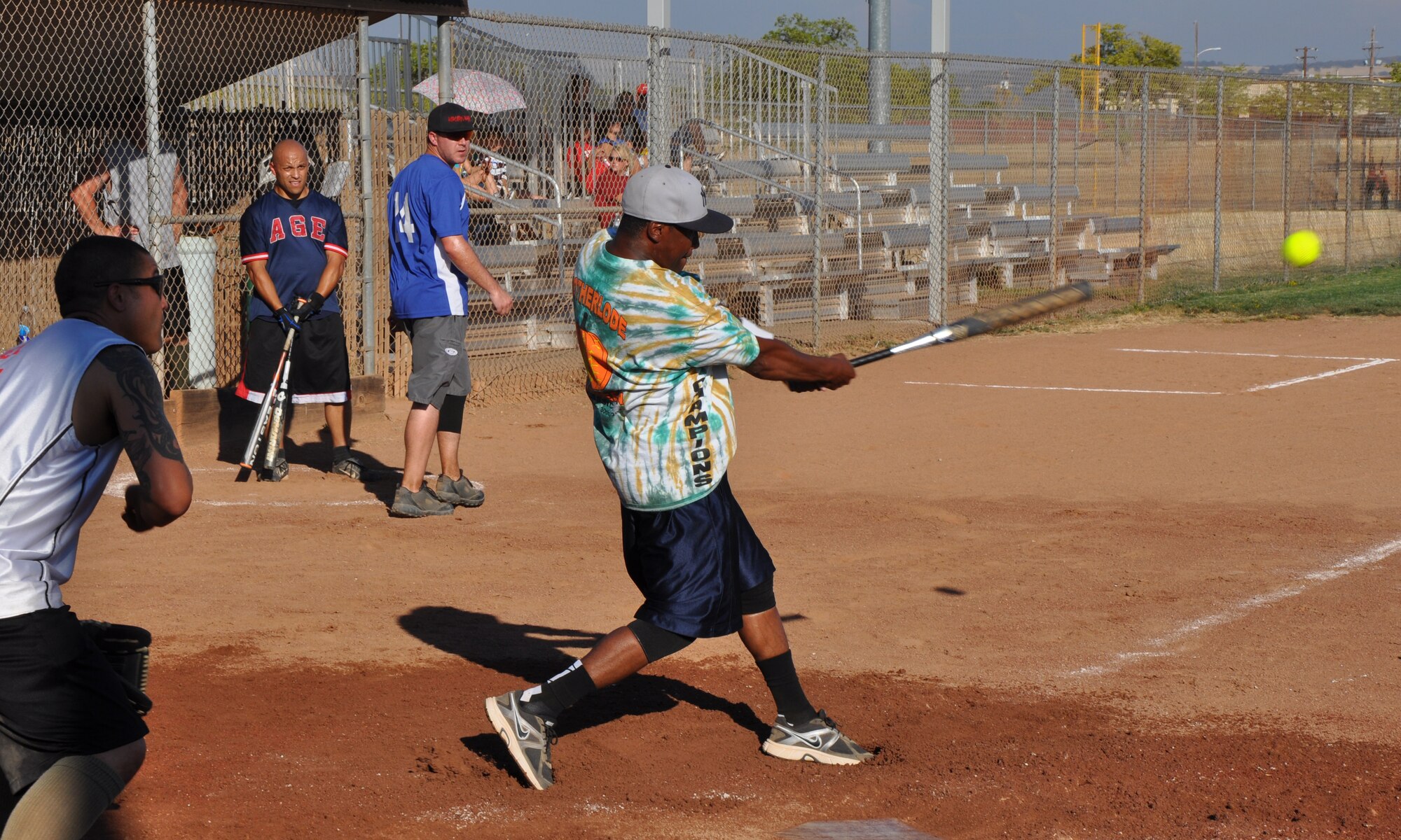 A member of the 9th Maintenance Squadron connects with a softball during Beale’s Intramural Softball Championships at Beale Air Force Base, Calif., Aug. 16, 2012. The 9th MXS defeated the 9th Munitions Squadron with a 10-9 victory. (U.S Air Force photo by Staff Sgt. Robert M. Trujillo)     