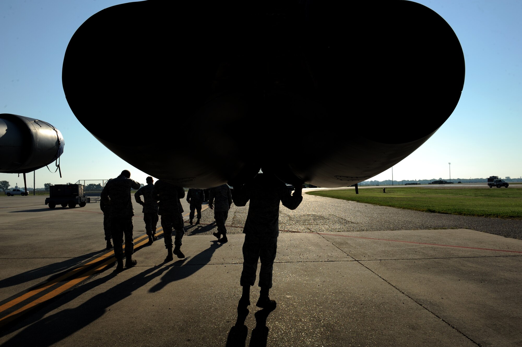 Tech. Sgt. Michael Bayne, 2nd Aircraft Maintenance Squadron, looks inside the engine of a B-52H Stratofortress bomber on Barksdale Air Force Base, La., Aug. 20. Bayne is one of five crew chiefs participating in the 2012 Global Strike Challenge. For the crew chiefs' portion of the challenge, Bayne and his team will be evaluated on how they perform their pre-flight routine and knowledge of their job. (U.S. Air Force photo/Airman 1st Class Benjamin Gonsier)(RELEASED)
