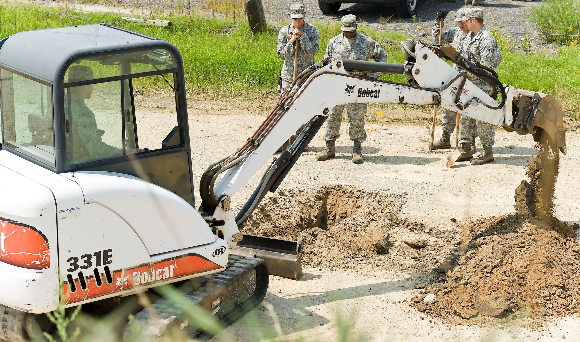 Members of the 436th Civil Engineer Squadron locate a simulated ruptured gas line Aug. 21, 2012, at Dover Air Force Base, Del. A simulated gas leak and repair was part of the Aug. 20-22 Major Accident Response Exercise, held to test Team Dover’s readiness to respond to threats and emergencies. Dover AFB partnered with members of the local community during the MARE to strengthen cooperation and communication between agencies. (U.S. Air Force photo by Roland Balik)