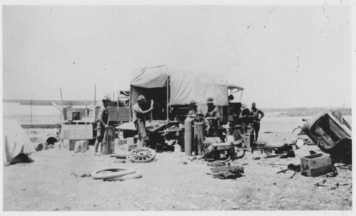 The machine shop truck at Satevo in April 1916. The mechanics appear to be working on a car or truck tires. (Vernon L. Burge Collection, Airman Memorial Museum)