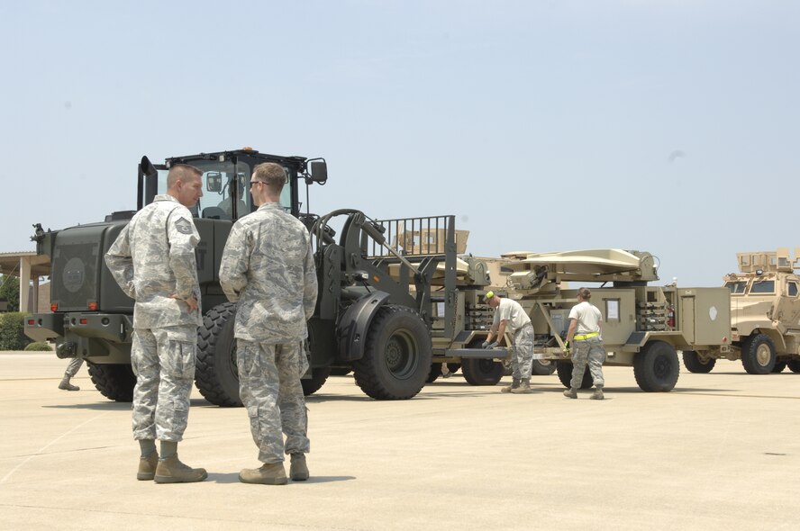 Senior Master Sgt. Frank Graziano, 20th Logistics Readiness Squadron superintendent of deployment and distribution and a native of Fowler, Ohio, supervises the loading of equipment on to a Russian Antonov An-124 Ruslan at Shaw Air Force Base, S.C., June 30, 2012. Airmen from 20th LRS loaded three mine-resistant ambush-protected vehicles, two satellite communication devices and additional supplies on to the plane for 8th Army in the Republic of Korea. (U.S. Air Force photo by Airman 1st Class Krystal Jeffers/Released)