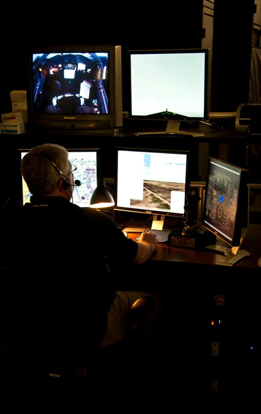 A simulator instructor monitors a student pilot’s flight in one of Jarvis Hall’s T-38 simulators from a bank of computers at Laughlin air Force Base, Texas, Aug. 15, 2012. Laughlin’s T-6, T-38 and T-1 aircraft simulators help teach would-be pilots the foundation and basic skills necessary for Air Force pilots and help graduate Laughlin’s more than 300 pilot graduates each year. (U.S. Air Force photo/Senior Airman Scott Saldukas)