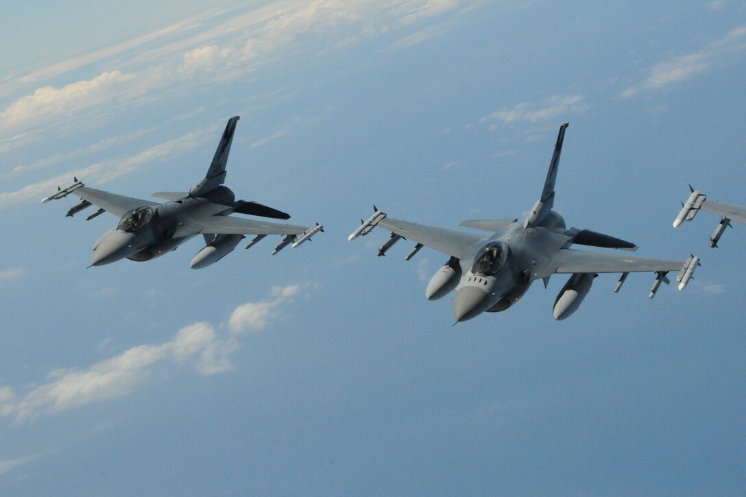 U.S. Air Force F-16C fighter jets from the 144th Fighter Wing, Fresno, Calif. provide Rescue Combat Air Patrol during a personnel recovery mission during the 2012 Rim of the Pacific Exercise on the island of Oahu, Hawaii on July 23, 2012. (Air National Guard photo by Master Sgt. David J. Loeffler)