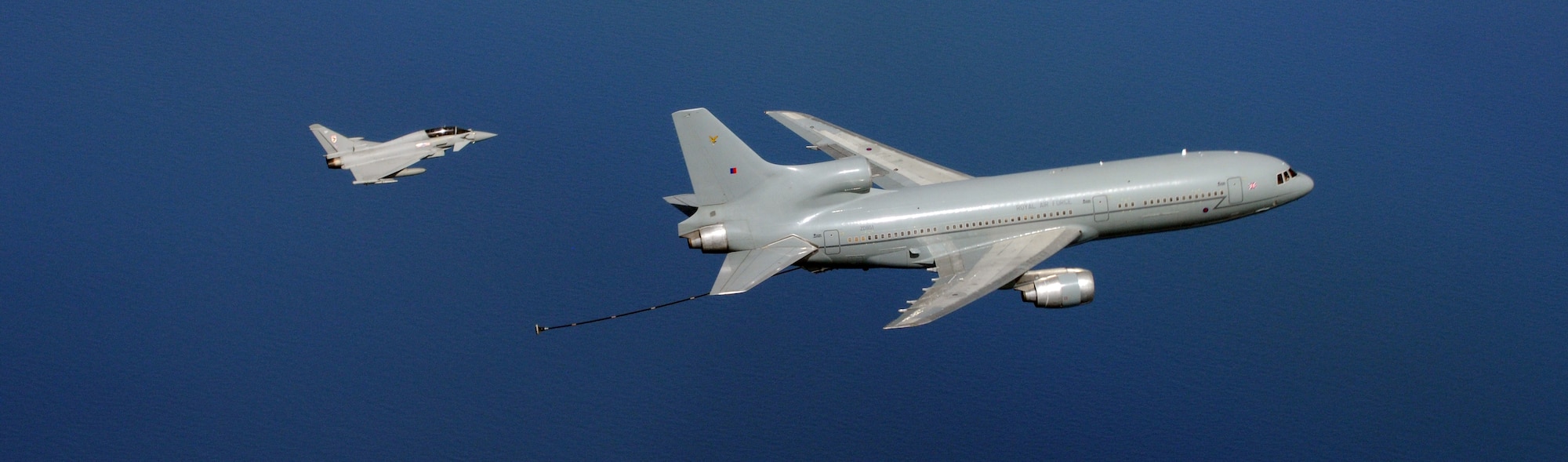 NORTH SEA – A Royal Air Force Eurofighter Typhoon flies off the tail of an RAF L-1011 TriStar aerial refueling tanker from 216 Squadron, RAF Brize Norton, during a formation flight Aug. 16, 2012. The formation included the TriStar and a U.S. Air Force KC-135 from the 100th Air Refueling Wing, RAF Mildenhall, and was flown to better familiarize NATO tanker aircrews with their partner nations’ air refueling procedures. (U.S. Air Force photo/Staff Sgt. Austin M. May)