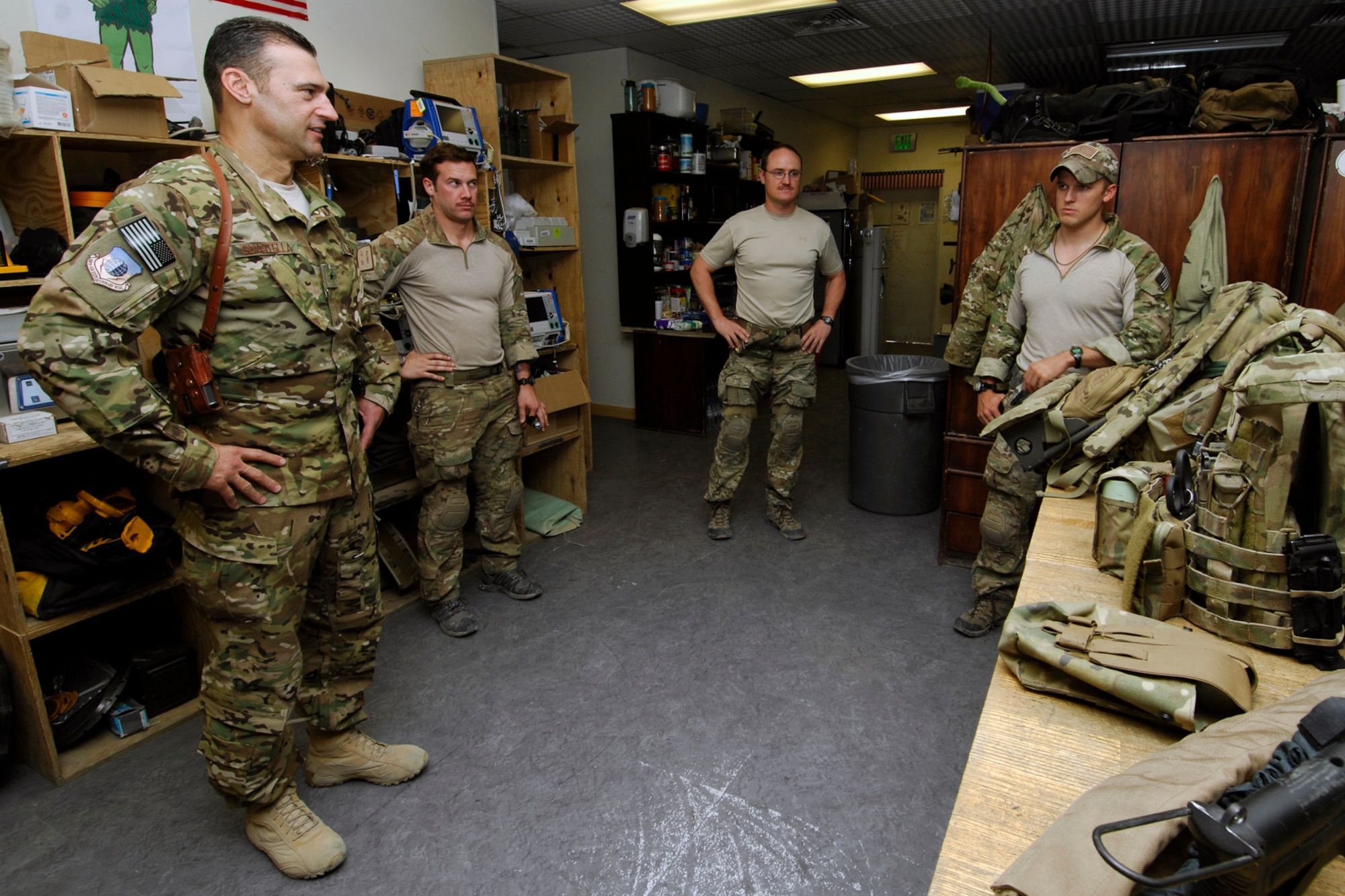 Brig. Gen. Joseph Guastella, 455th Air Expeditionary Wing commander (left), converses with pararescue jumpers and combat rescue officers assigned the 83rd Expeditionary Rescue Squadron at Bagram Airfield, Afghanistan, Aug. 18, 2012. Guastella took part in a nearly two hour training mission with the PJs and CROs of the 83 ERQS, also known as the “Pedros,” to see firsthand how they contribute to the war on terrorism in Afghanistan. Guastella expressed his appreciation for their efforts and for their part in continuing to making the mission a success. (U.S. Air Force photo/SSgt Jeff Nevison)