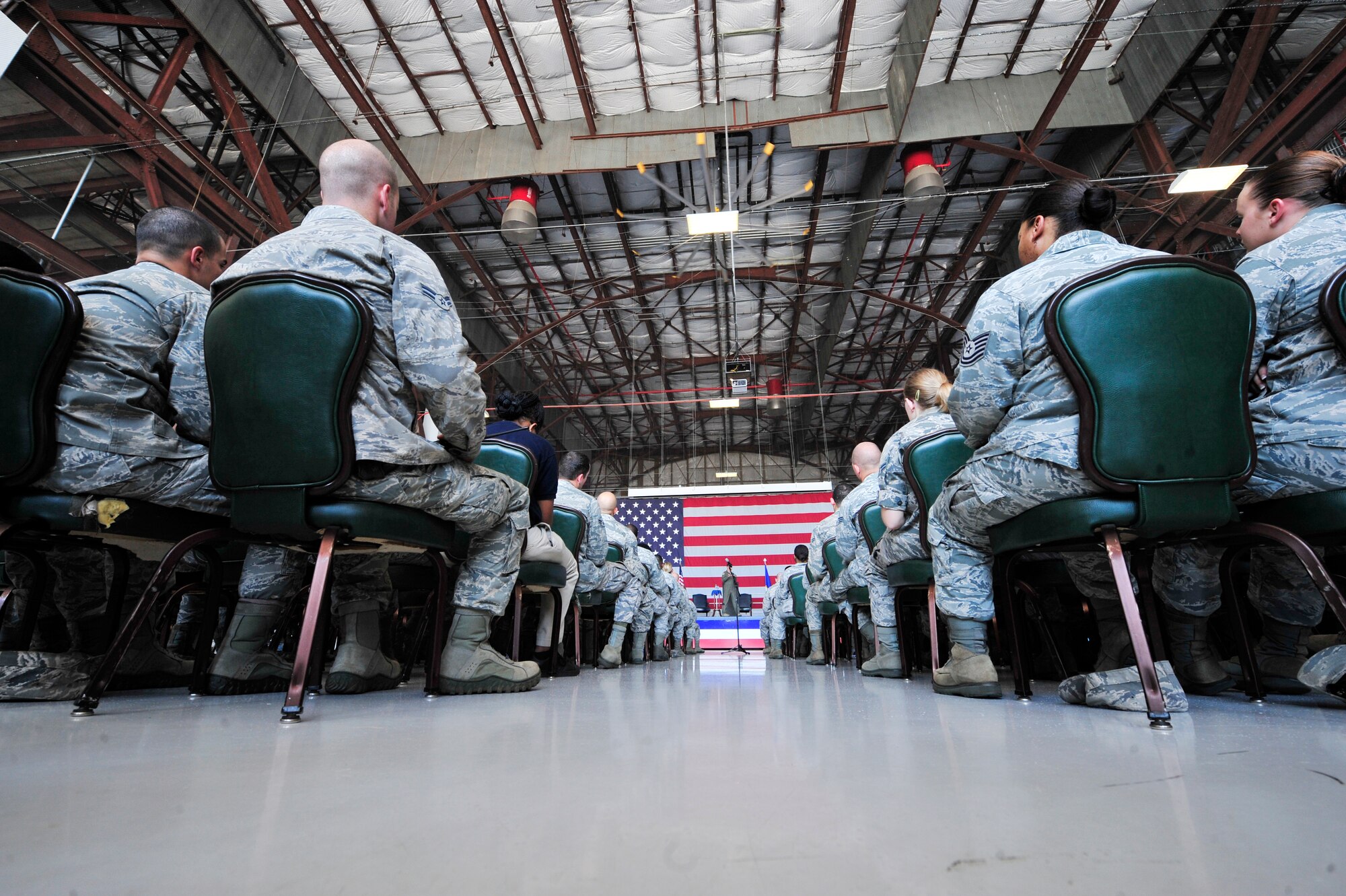 U.S. Airmen gather in Hangar 1200 for the visit of Secretary of the Air Force Michael Donley at Shaw Air Force Base, S.C., Aug. 16, 2012.  During the forum, Donley spoke to Airmen about the future changes of the Air Force in Fiscal Year 13 such as budgeting and modernization.(U.S. Air Force photo by Airman Nicole Sikorski/Released)