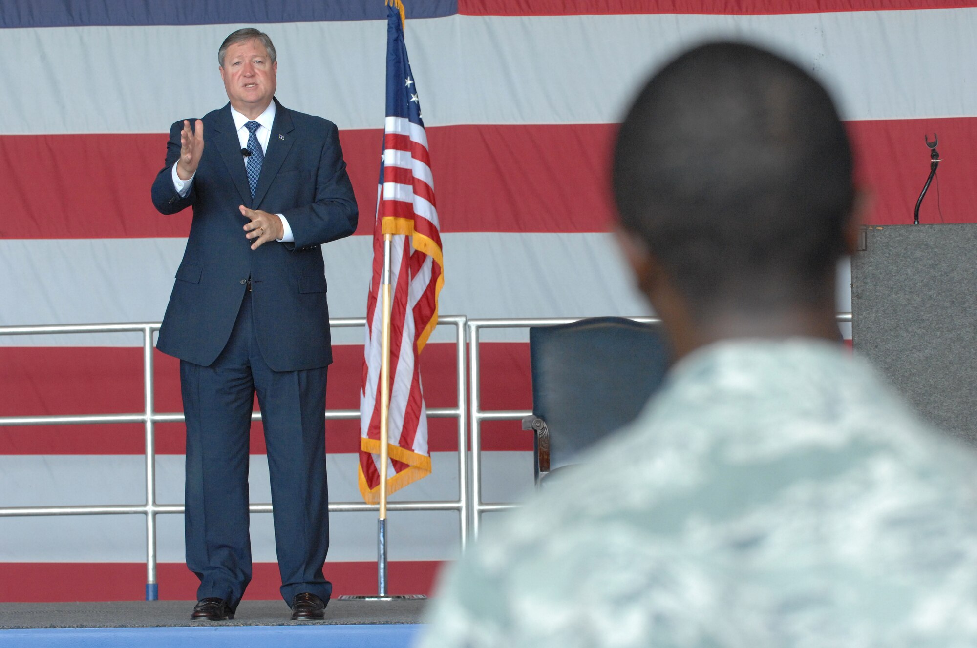 Secretary of the Air Force Michael Donley speaks to Airmen at Hangar 1200, Shaw Air Force Base, S.C., Aug. 16, 2012.  Donley spoke about total force integration and shaping the Air Force today to ensure the strength for tomorrow.(U.S. Air Force photo by Airmen Nicole Sikorski/Released)