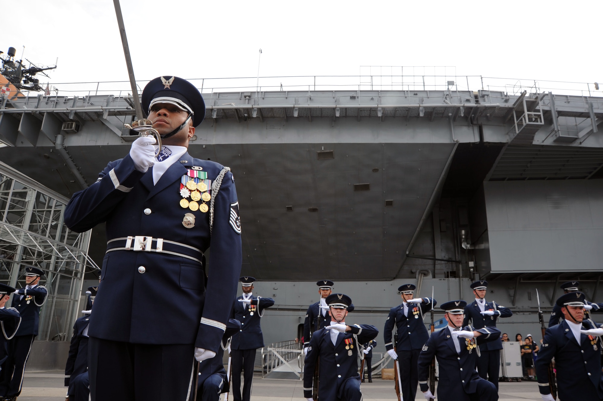 Master Sgt. Whitfield Jack, U.S. Air Force Honor Guard Drill Team superintendent, stands with his unit Aug. 19 on Pier 86, New York, N.Y., following their Air Force Week performance. Jack is a native of Brooklyn, N.Y., and former military training instructor. (U.S. Air Force photo by Senior Airman Tabitha N. Haynes)