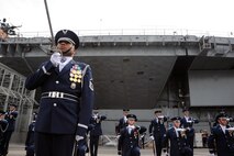 Master Sgt. Whitfield Jack, U.S. Air Force Honor Guard Drill Team superintendent, stands with his unit Aug. 19 on Pier 86, New York, N.Y., following their Air Force Week performance. Jack is a native of Brooklyn, N.Y., and former military training instructor. (U.S. Air Force photo by Senior Airman Tabitha N. Haynes)