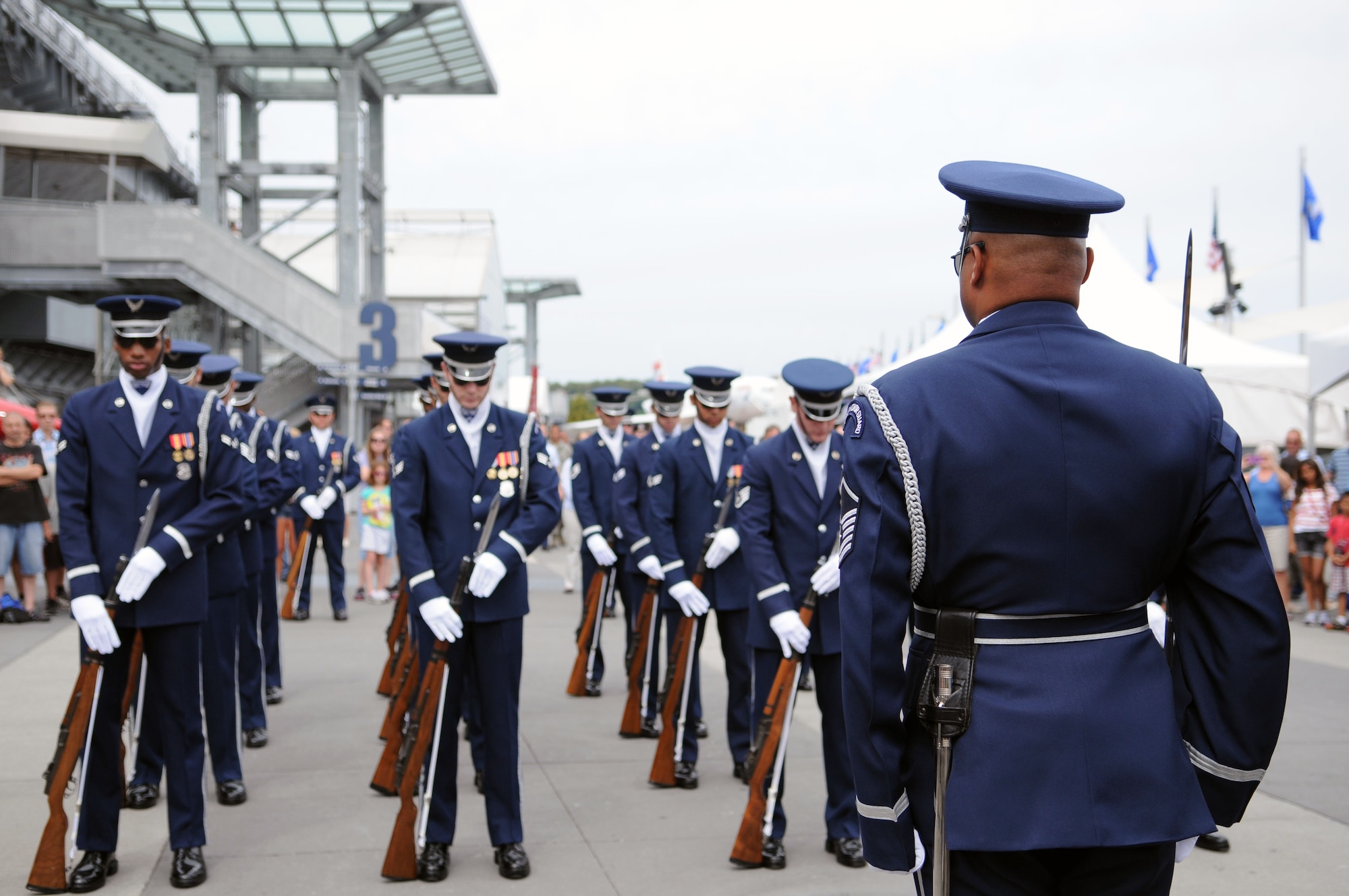 The U.S. Air Force Honor Guard Drill Team stand at ceremonial at-ease Aug. 19 in New York, N.Y., waiting for the order of attention from Master Sgt. Whitfield Jack, superintendent of the Drill Team, and native of Brooklyn, N.Y. The Drill Team is performing during Air Force Week 2012. (U.S. Air Force photo by Senior Airman Tabitha N. Haynes)