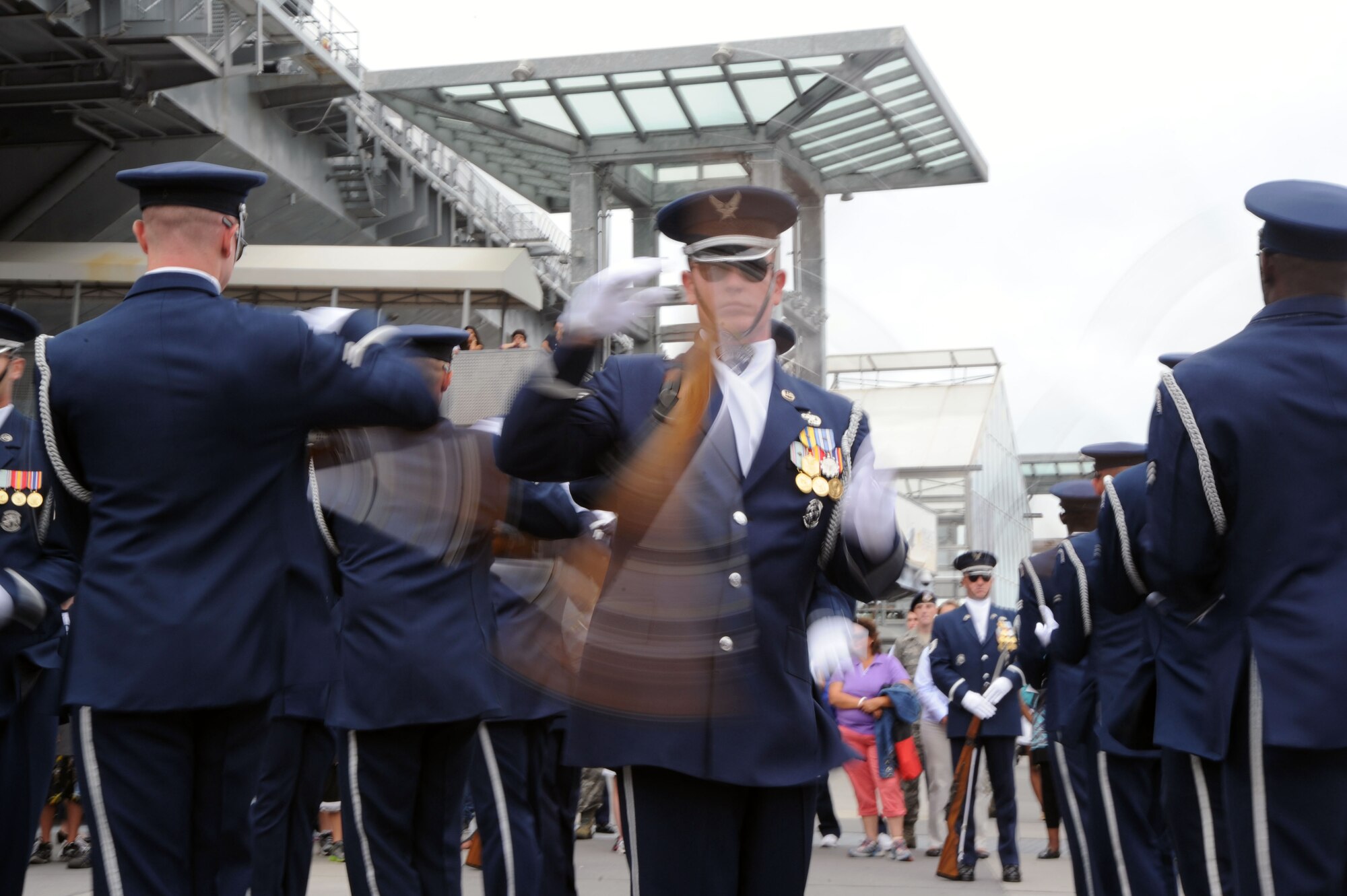 The U.S. Air Force Honor Guard Drill Team performs their signature move, the double spins, spinning the M-1 rifle up to 40 miles per hour. The Drill Team promotes the Air Force mission by showcasing drill performances at public and military venues to recruit, retain, and inspire Airmen. (U.S. Air Force photo by Senior Airman Tabitha N. Haynes)