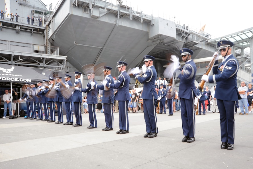 The U.S. Air Force Honor Guard Drill Team performs their synchronized line formation Aug. 19 during Air Force Week in New York, N.Y. The Drill Team promotes the Air Force mission by showcasing drill performances at public and military venues to recruit, retain, and inspire Airmen. (U.S. Air Force photo by Senior Airman Tabitha N. Haynes)