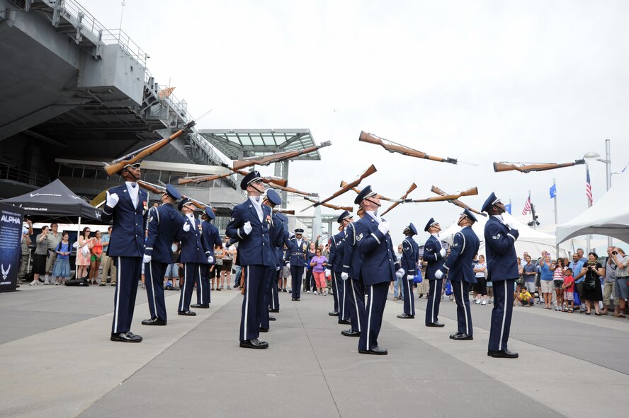 The U. S. Air Force Honor Guard Drill Team performs during Air Force Week Aug. 19 on Pier 86, New York, N.Y. The Drill Team promotes the Air Force mission by showcasing drill performances at public and military venues to recruit, retain, and inspire Airmen. (U.S. Air Force photo by Senior Airman Tabitha N. Haynes)