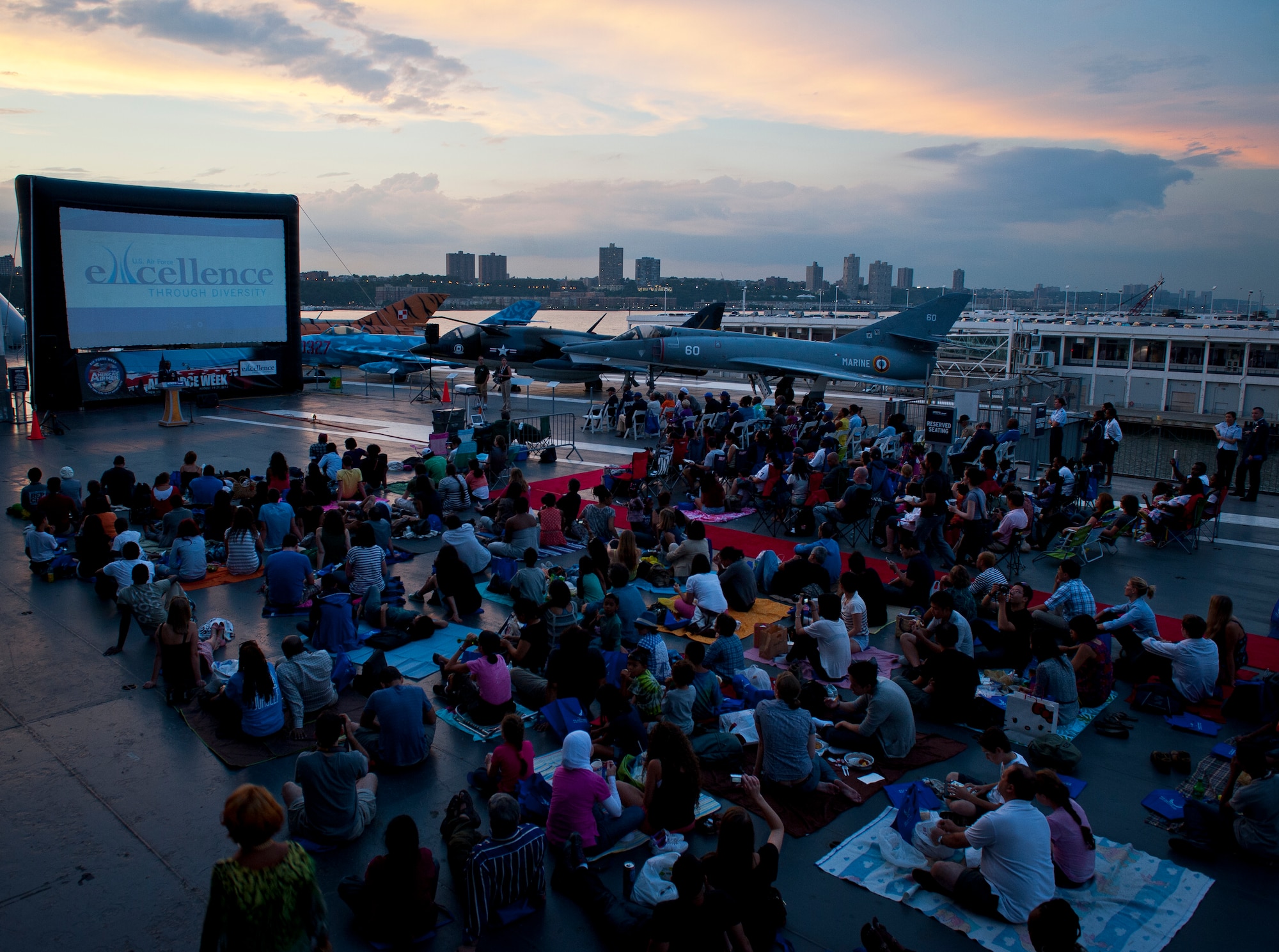 United States Air Force officials, local residents and tourists wait for the movie, Red Tails, to play at Pier 86 during 2012 Air Force Week in New York City, on August 20, 2012. The movie represented Tuskegee Airman missions in World War II. More than five Tuskegee Airman were present for the event. (U.S. Air Force photo/Senior Airman Andrew Lee)