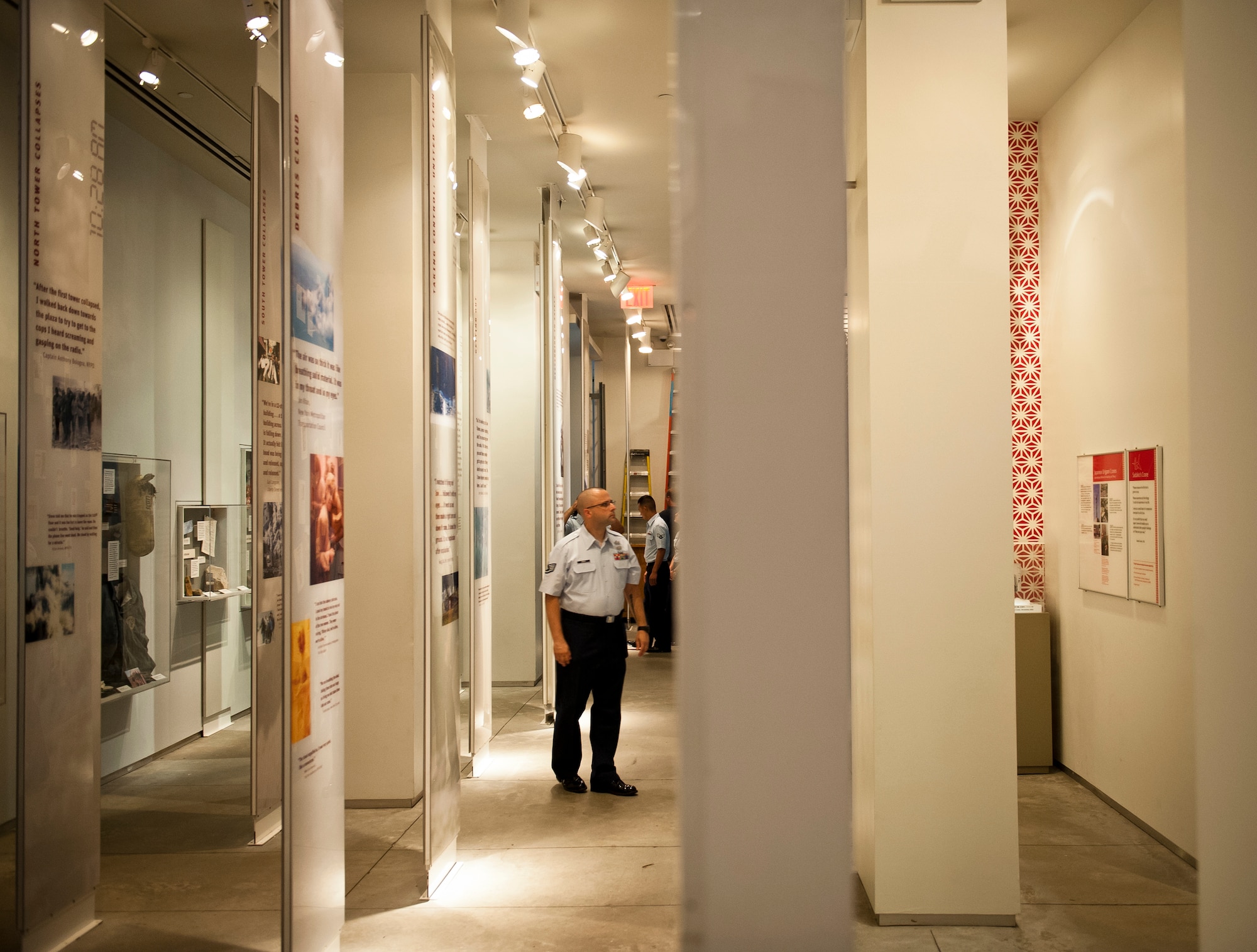 Staff Sergeant Tim Piefer looks at the photos of the missing and dead men, women and children from the terrorist attacks at the World Trade Center Building on September 11, 2001, at the 9/11 Museum on August 20, 2012 in New York City. Piefer is from 87th Air Base Wing JA at Joint Base McGuire-Dix-Lakehurst, N.J. (U.S. Air Force photo/Senior Airman Andrew Lee)