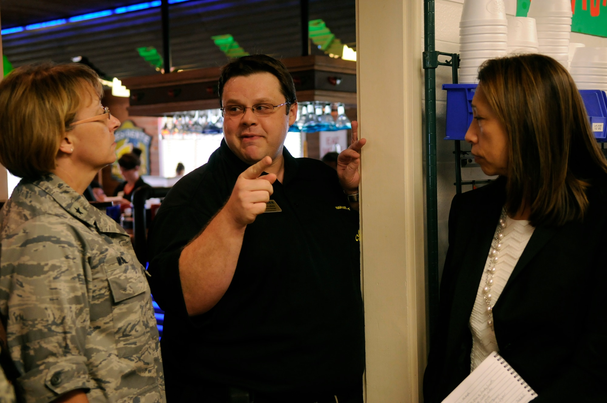 U.S. Air Force Brig. Gen. Eden Murrie, Air Force Services director, listens to Daniel Labatte, 18th Force Support Squadron Chili's manager, talk about kitchen operations at one of the busiest Chili's in the world during a tour of the 18th FSS facilities on Kadena Air Base, Japan, Aug. 17, 2012. The Kadena Chili's was the first stand-alone Chili's Restaurant in the Air Force. Murrie visited Okinawa as part of a Pacific Air Forces tour to become more familiar with overseas force support services. (U.S. Air Force photo/ Airman 1st Class Tara A. Williamson)