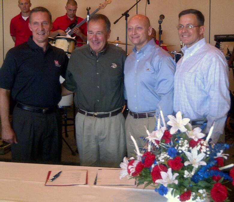 Brig. Gen. Thomas W. Kula, left, Southwestern Division commander, is joined by Mr. Johnny Morris, Bass Pro Shops founder and CEO; Col. Anthony C. Funkhouser, Northwestern Division Commander; and Maj. Gen. John W. Peabody, Mississippi Valley Division Commander, for the signing of a Memorandum of Understanding between the U.S. Army Corps of Engineers and Bass Pro Shops. The c...eremony was held in Little Rock during the Corps’ Strategic Leader Conference. The MOU formalizes a partnership with Bass Pro Shops and the Corps to provide the opportunity to reach millions of recreation enthusiasts to spread the message of safety and increase the public's knowledge about all the great opportunities the Corps offers for recreation.