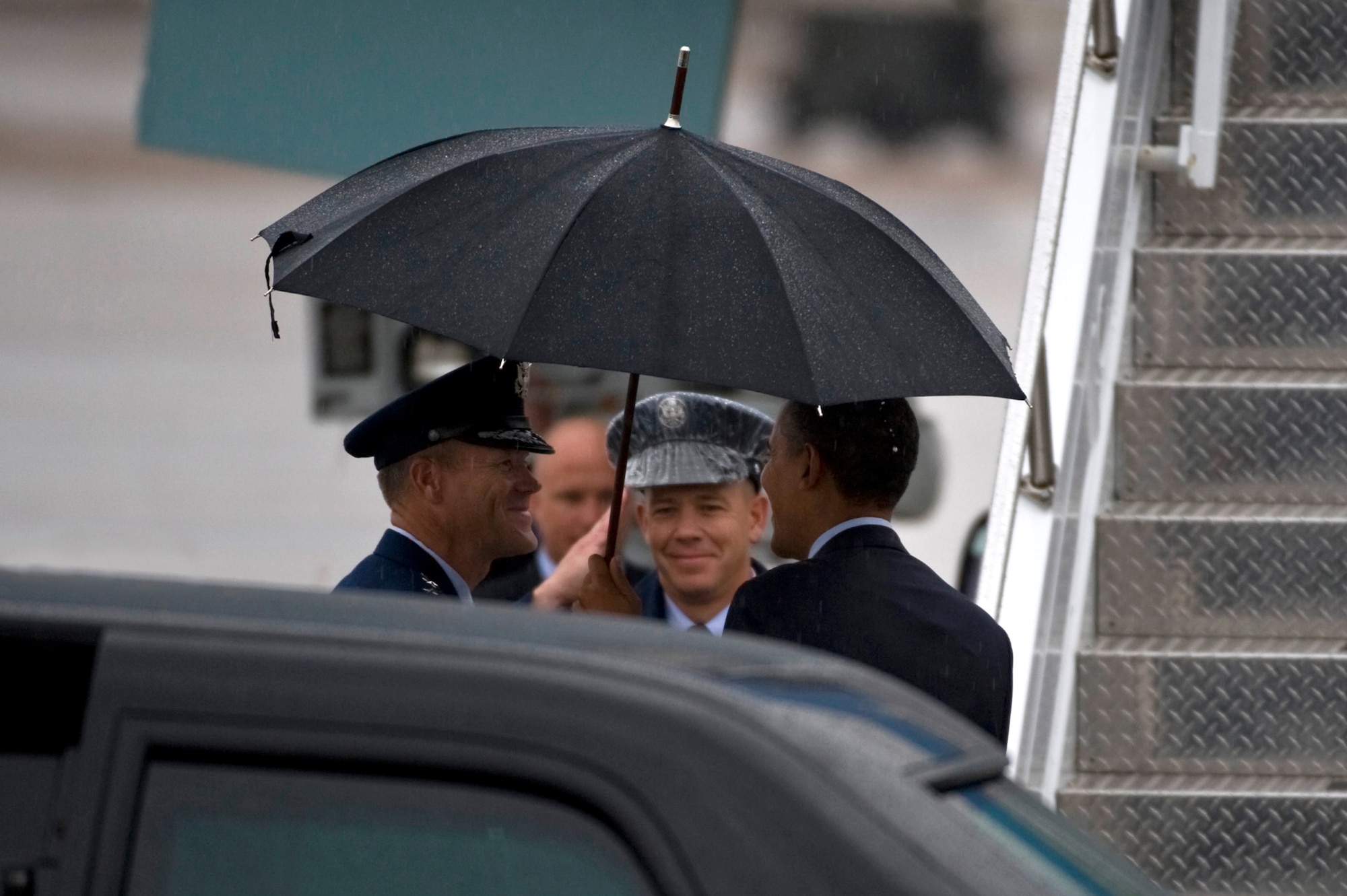 President Barack Obama and Maj. Gen. Jeffrey Lofgren, U.S. Air Force Warfare Center commander, talk upon the president's departure Aug. 22, 2012, at Nellis Air Force Base, Nev. The president  delivered a speech at Canyon Springs High School in North Las Vegas today, discussing education and jobs. (U.S. Air Force photo by Airman 1st Class Daniel Hughes)