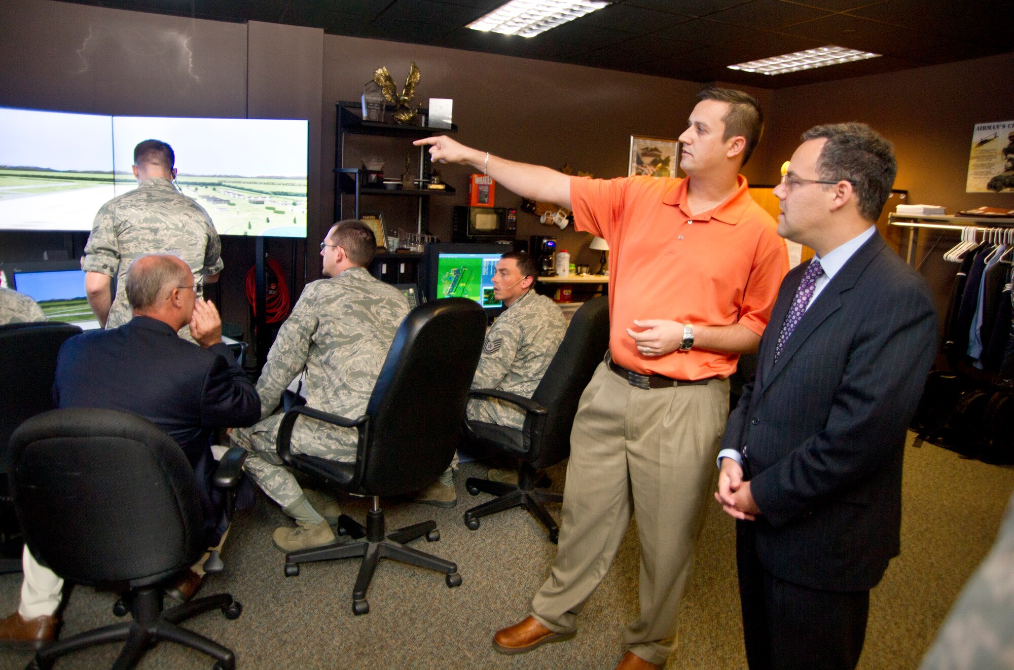 Kevin McDonald, 334th Training Squadron air traffic control instructor, explains how the air traffic control simulator is used for training students to the Honorable Daniel B. Ginsberg, Assistant Secretary of the Air Force for Manpower and Reserve Affairs Aug. 21, 2012, at Cody Hall during his tour of Keesler Air Force Base, Miss.  During his two-day tour he also visited other various training squadrons, the Keesler Hospital A-Tower and the 403rd Wing.  (U.S. Air Force photo by Adam Bond)