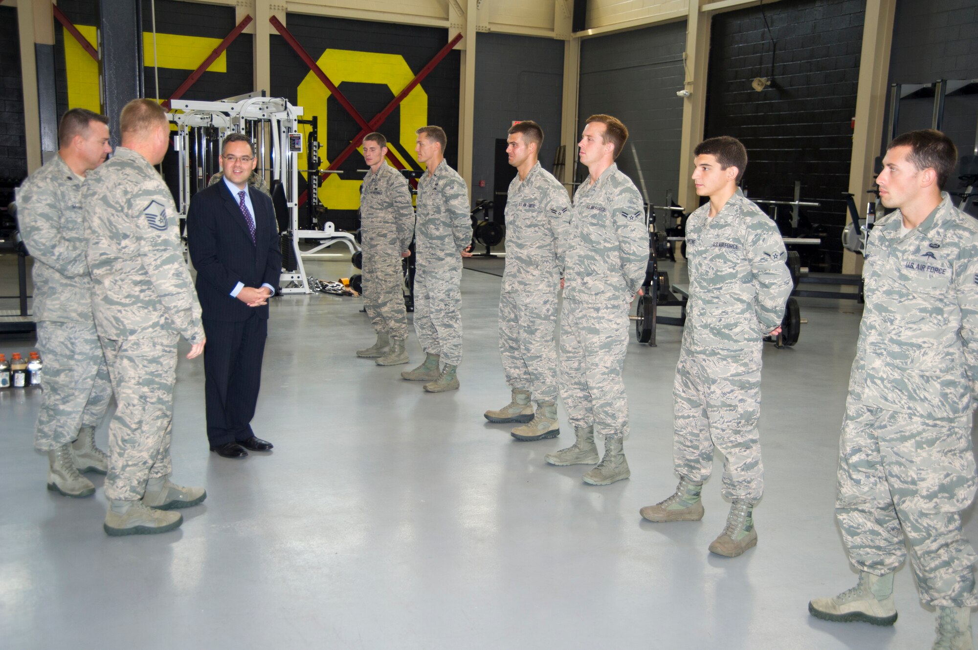 Honorable Daniel B. Ginsberg, Assistant Secretary of the Air Force for Manpower and Reserve Affairs, receives an overview of combat controller training from Lt. Col. Jeffrey McLemore, 334th Training Squadron commander, and Master Sgt. Brad Reilly, 334th TRS instructor supervisor, at Matero Hall, Aug. 21, 2012, during his tour of Keesler Air Force Base, Miss. During his two-day tour he also visited other various training squadrons, the Keesler Hospital A-Tower and the 403rd Wing.  (U.S. Air Force photo by Adam Bond)