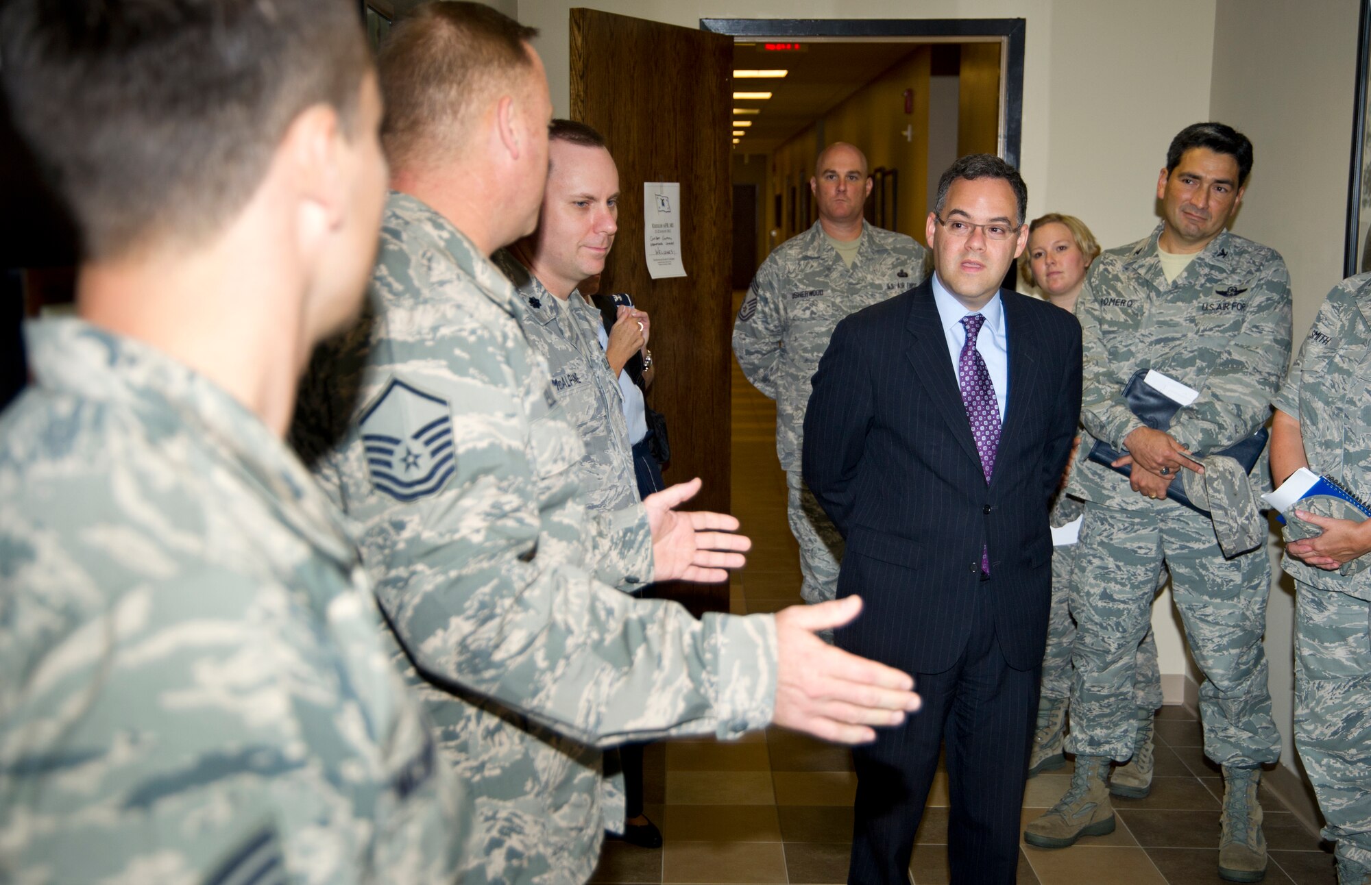 Honorable Daniel B. Ginsberg, Assistant Secretary of the Air Force for Manpower and Reserve Affairs, receives an overview of combat controller training from Master Sgt. Brad Reilly, 334th Training Squadron instructor supervisor, at Matero Hall, Aug. 21, 2012, during his tour of Keesler Air Force Base, Miss. During his two-day tour he also visited other various training squadrons, the Keesler Hospital A-Tower and the 403rd Wing.  (U.S. Air Force photo by Adam Bond)