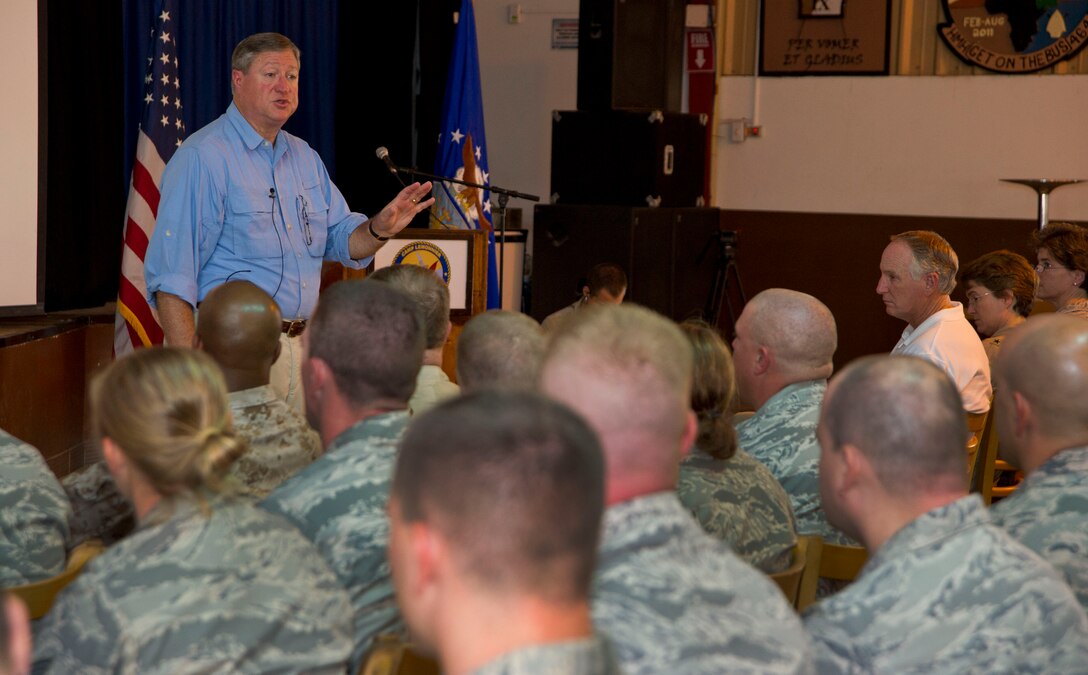 Secretary of the Air Force Michael Donley discusses Air Force topics with Airmen deployed to Camp Lemonnier, Djibouti,on Aug. 22, 2012.  Donley visited Camp Lemonnier to see how the Air Force supports the Combined Joint Task Force - Horn of Africa mission. (U.S. Air Force photo/Staff  Sgt. Christopher Ruano)