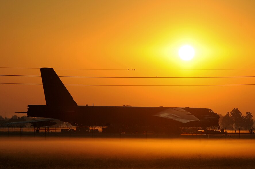 The sun rises over a B-52H Stratofortress on Barksdale Air Force Base, La., Aug. 22. The B-52 was one of many aircraft featured during Air Force week due to its long history of service, and the Air Force named 2012 the year of the B-52. The B-52 has served in every conflict since the Vietnam War. During Desert Storm, the aircraft delivered 40 percent of all the weapons dropped by coalition forces. The heavy bomber is capable of dropping or launching the widest array of weapons in the U.S. inventory. (U.S. Air Force photo/Airman 1st Class Micaiah Anthony)(RELEASED)