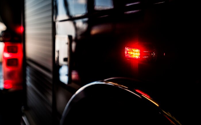 628th Civil Engineer Squadron firefighters, exit the fire department during a drill Aug. 9, 2012, at Joint Base Charleston – Air Base, S.C. The firefighters have two minutes from notification of an emergency to be ready to leave the fire station. (U.S. Air Force photo/Senior Airman Dennis Sloan)