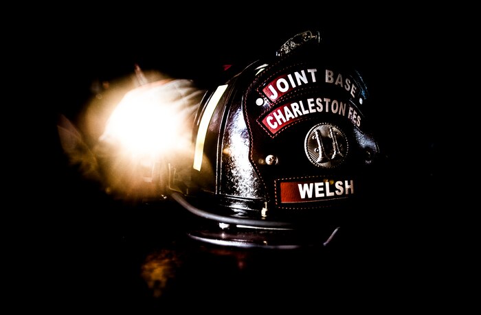 A firefighter’s helmet is equipped with a flashlight to help navigate through dark areas. Each firefighter has six pieces of equipment to put on in less than two minutes when responding to an emergency call. (U.S. Air Force photo/Senior Airman Dennis Sloan)