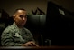 2nd Lieutenant Ildar Ibragimov, 628th Medical Support Squadron, medical information systems flight commander, sits at his desk at the 628th Medical Group Aug. 18, 2012, at Joint Base Charleston – Air Base, S.C. Ibragimov immigrated to the United States in 2005 and is a native of the former Soviet Union. (U.S. Air Force Photo / Airman 1st Class Tom Brading)