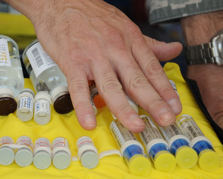 Tech. Sgt. Kris Wooster, 2nd Medical Operations Squadron ambulance services chief, inventories vials of epinephrine on Barksdale Air Force Base, La., Aug. 20. Epinephrine is used to treat a variety of emergencies that may occur including severe allergic reactions. (U.S. Air Force photo/ Senior Airman Sean Martin)(RELEASED)