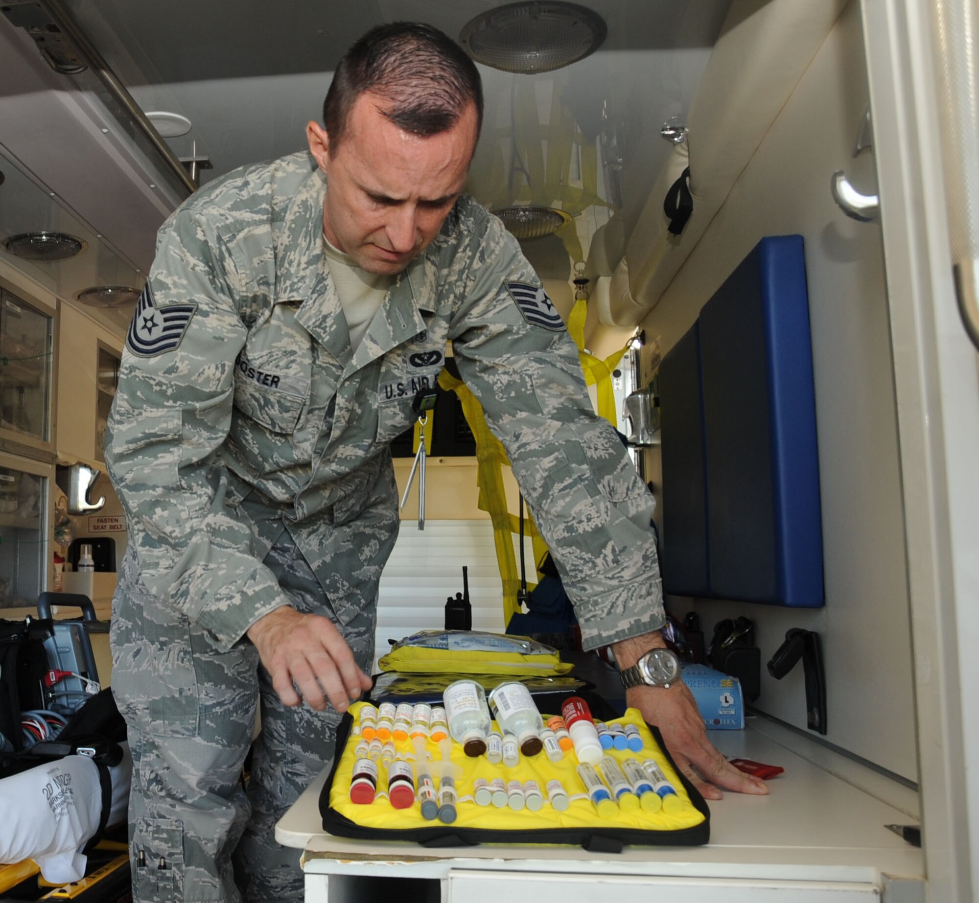 Tech. Sgt. Kris Wooster, 2nd Medical Operations Squadron ambulance services chief, inventories a narcotics bag on Barksdale Air Force Base, La., Aug. 20. The bag contains narcotics that may be administered to patients for various reasons, including pain relief, to keep someone conscious and treat symptoms they may be experiencing. (U.S. Air Force photo/ Senior Airman Sean Martin)(RELEASED)