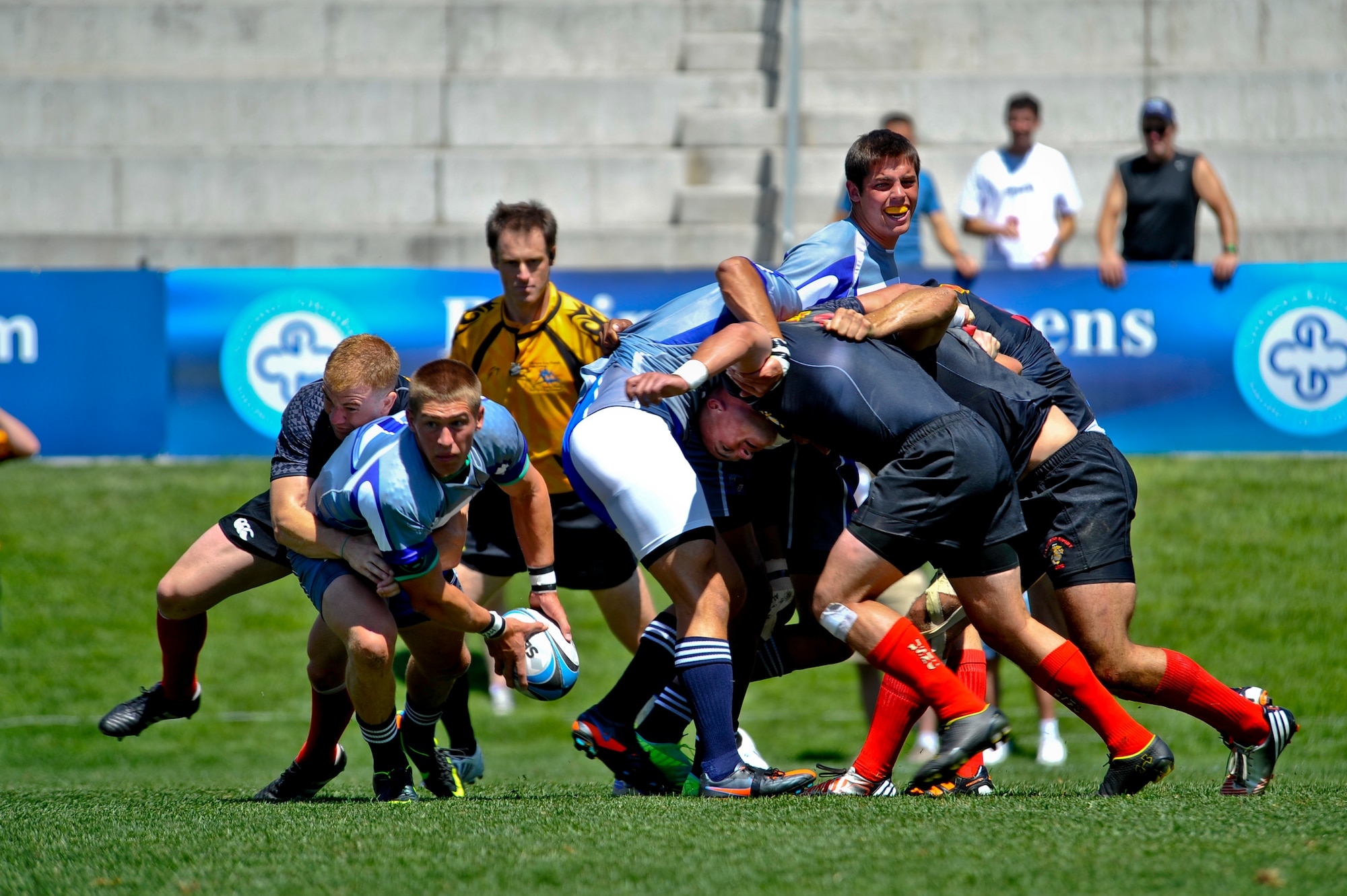 GLENDALE, Colo. --  The Air Force rugby team gains possession of the ball after a scrum against Marine rugby players Aug. 19. The Air Force lost their first Armed Forces Rugby Sevens Championship match in eight years, 31-33, to the Marines. (U.S. Air Force photo by Staff Sgt. Kathrine McDowell)