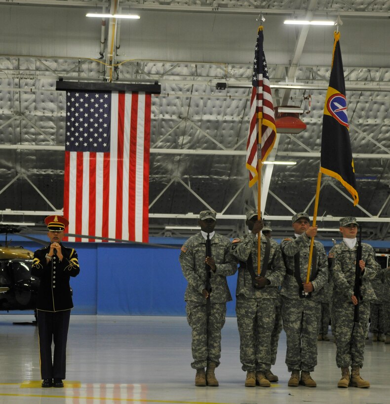 Army Master Sgt. Antonio Giuliano, U.S. Army Band “Pershing’s Own” vocalist, sings the National Anthem during a change of command ceremony Aug. 16, 2012 in Hangar 3. During the ceremony, Col. William D. McGarrity took command of the U.S. Army Air Operations Group from Col. Scott E. Sanborn. The U.S. Army Air Operations Group is headquartered at Fort McNair in Washington, D.C.  (U.S. Air Force photo/Senior Airman Lindsey A. Porter)
