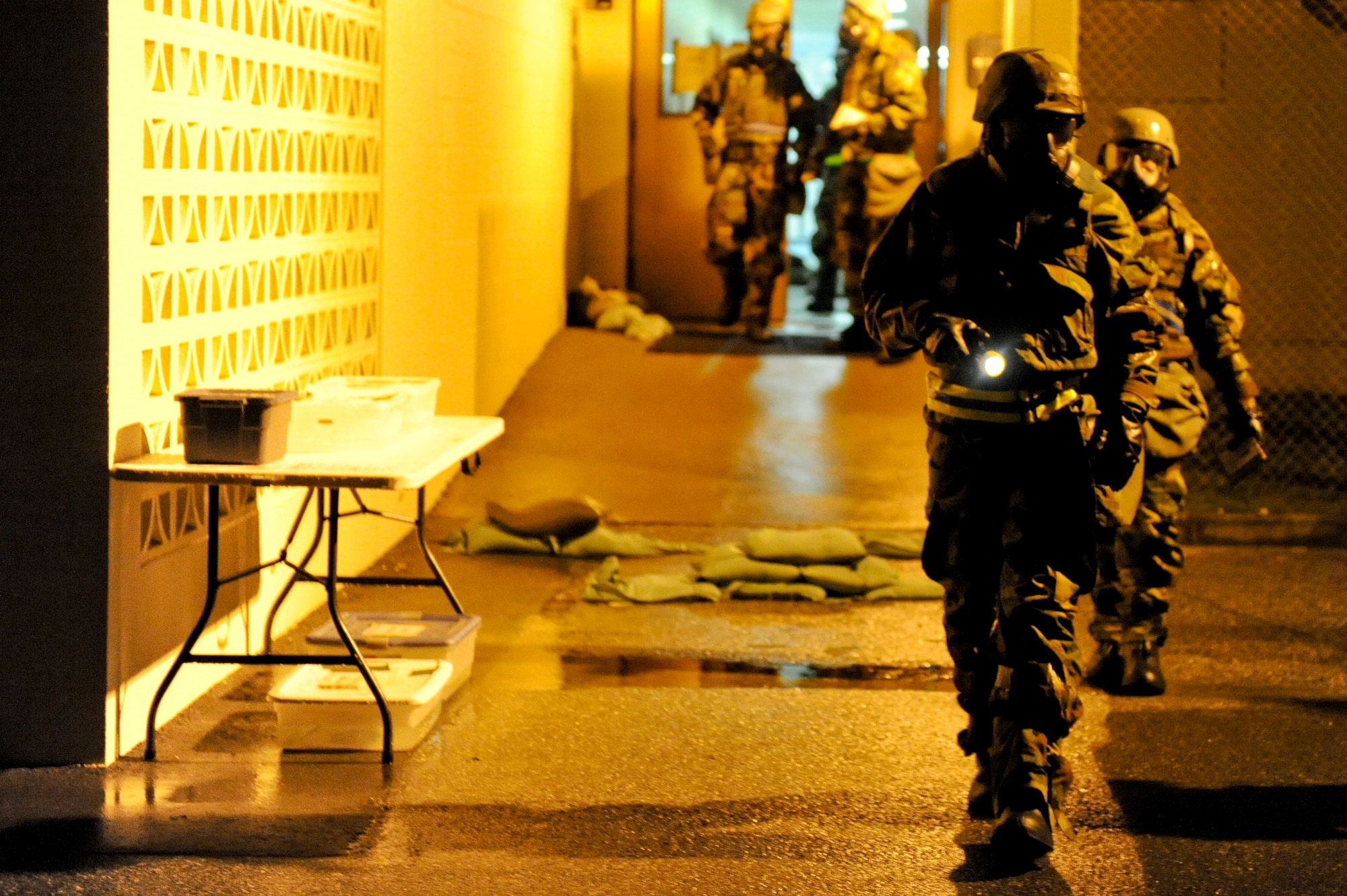 U.S. Air Force Senior Airman Logan Langley, 18th Communications Squadron network technician, starts out on a post-attack reconnaissance sweep during local operational readiness exercise Beverly High 12-5 on Kadena Air Base, Japan, Aug. 22, 2012. The purpose of a PAR sweep is to check around  the building for casualties, damage to the building, contaminants or unexplained explosive ordinances. (U.S. Air Force photo by Airman 1st Class Brooke P. Beers)