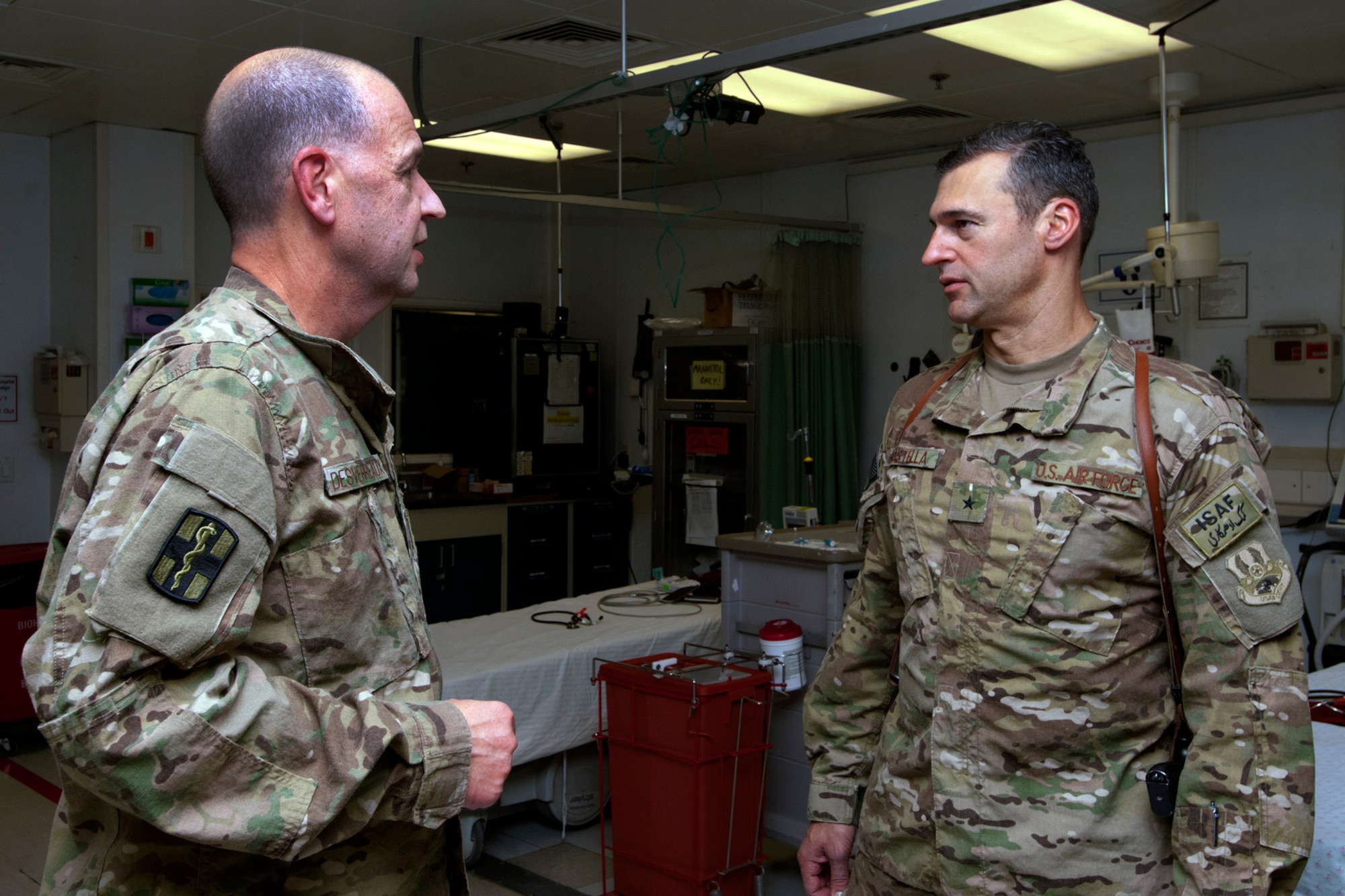 Brig. Gen. Joseph Guastella, 455th Air Expeditionary Wing commander (right), speaks with LtCol. Robert Desverreaux, 455th Expeditionary Medical Group Emergency Department Flight commander, about CJTH’s emergency room capacities to treat wounded servicemembers, local nationals and coalition forces at Bagram Airfield, Afghanistan, Aug. 20, 2012. Guastella toured the hospital to meet staff and learn about specialized services the hospital offers. Guastella expressed his appreciation to the members of CJTH for their hard work and dedication. (U.S. Air Force photo/SSgt Jeff Nevison)