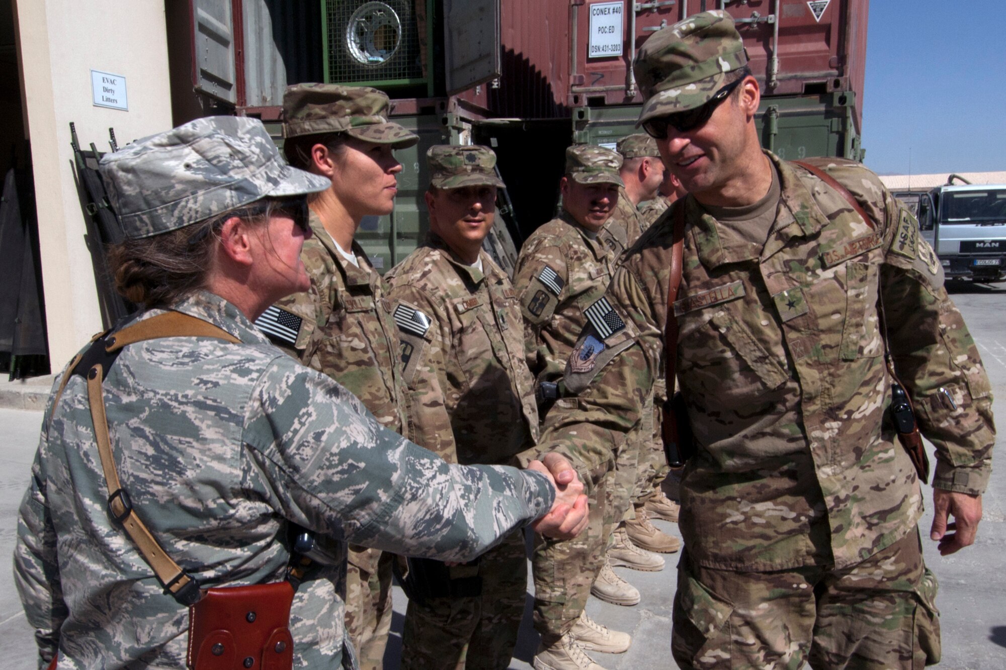 Brig. Gen. Joseph Guastella, 455th Air Expeditionary Wing commander (right), is greeted by 455th Expeditionary Medical Group leadership at the Craig Joint Theater Hospital at Bagram Airfield Afghanistan, Aug. 20, 2012. Guastella toured the hospital to meet staff and learn about specialized services the hospital offers. Guastella expressed his appreciation to the members of CJTH for their hard work and dedication in treating injured U.S. servicemembers, locals and coalition forces. (U.S. Air Force photo/SSgt Jeff Nevison)