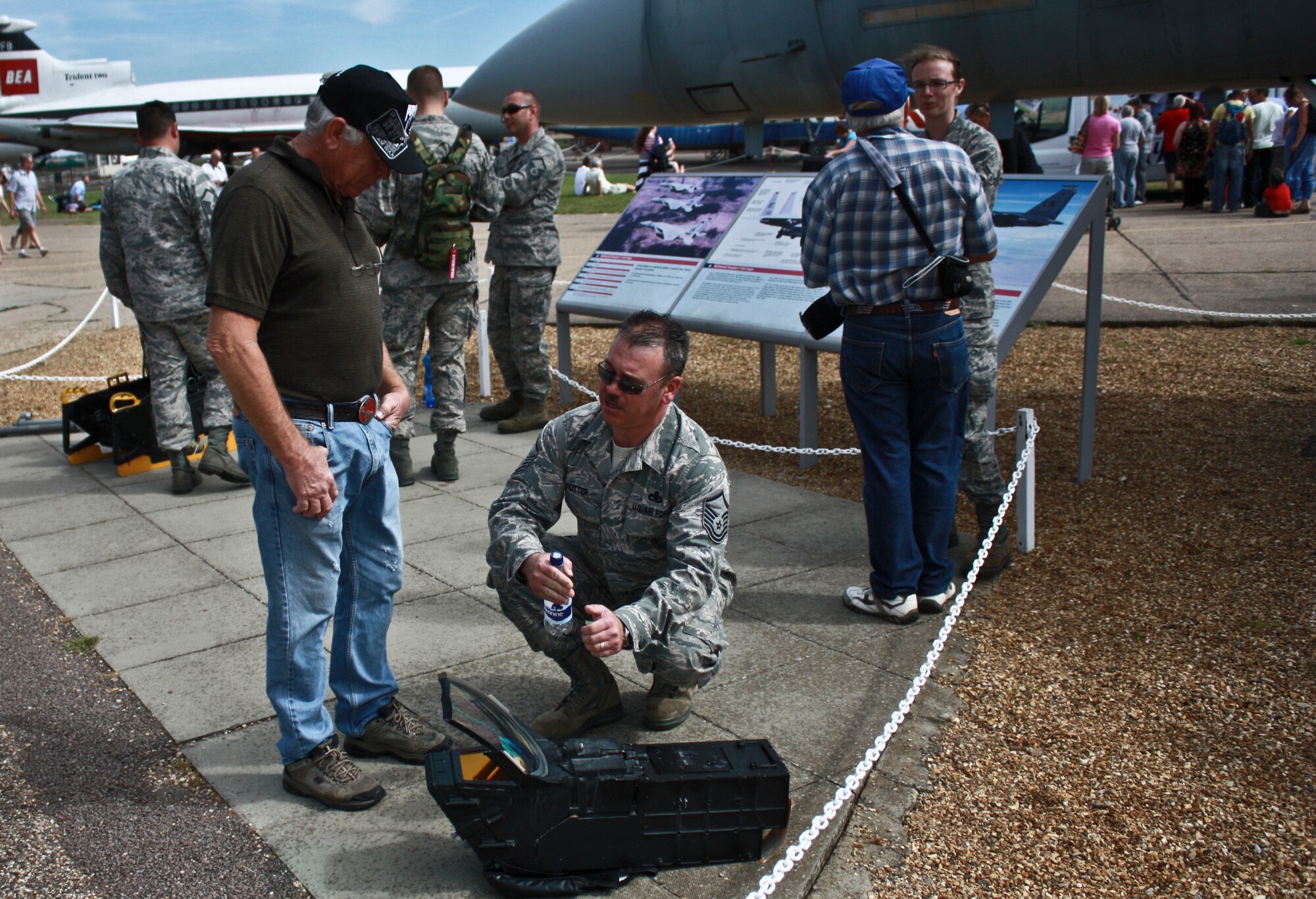 CAMBRIDGESHIRE, England - Master Sgt. Jim Potter, 48th Component Maintenance Squadron Avionics Fight superintendent, explains a piece of avionics equipment to Jimmy Potter from Jefferson City, Tenn., during the Imperial War Museum's American Air Day at Duxford, U.K., Aug. 17, 2012. The day provided the local community the opportunity to see what Airmen stationed in England do on a daily basis. Events included a mix of flying and ground-based activities that featured personnel from the 48th Fighter Wing, the 100th Air Refueling Wing and the 501st Combat Support Wing. (U.S. Air Force photo by Senior Airman Connor Estes)