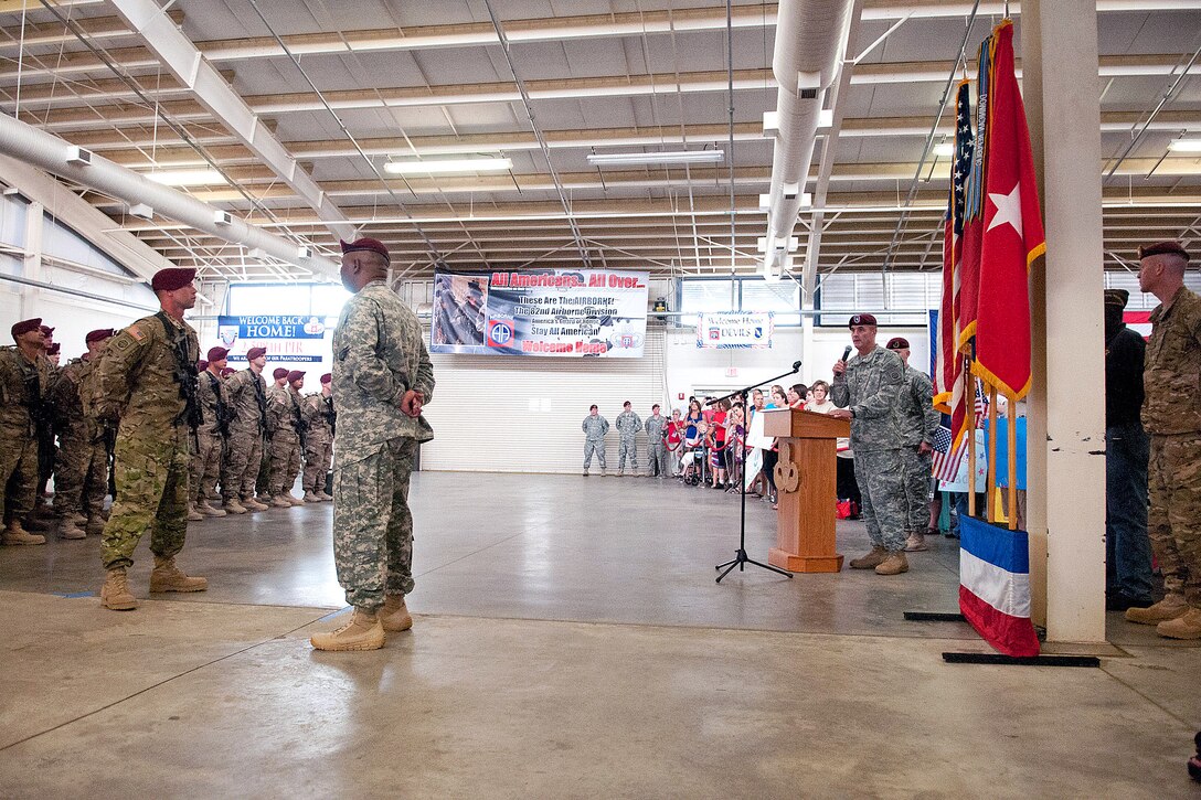 Army Brig. Gen. Charles Flynn welcomes paratroopers home on Pope Army Airfield, Fort Bragg, N.C., Aug. 2012. Flynn is commanding general of Task Force All America and also commanded the 82nd Airborne Division’s 1st Brigade Combat Team during a 2007 deployment to Iraq.