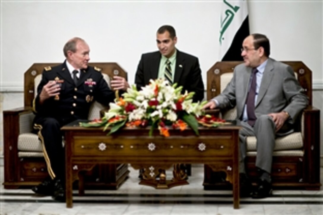Iraqi Prime Minister Nuri al-Maliki, right, meets with U.S. Army Gen. Martin E. Dempsey, left, chairman of the Joint Chiefs of Staff, in Baghdad, Aug. 21, 2012. 
