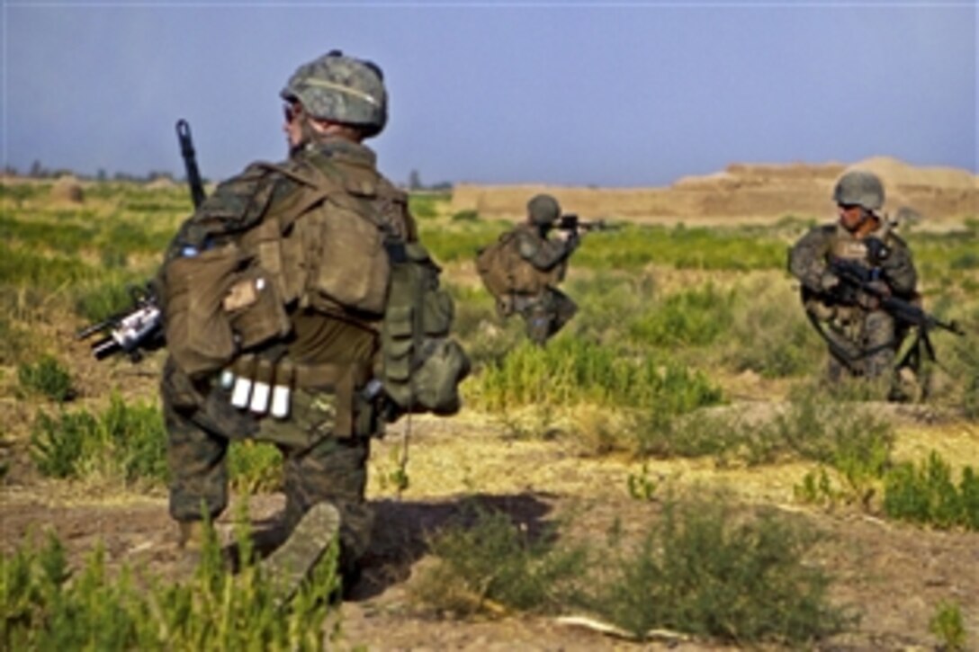 U.S. Marines patrol through Trek Nawa, an area with known insurgent sites, in Afghanistan's Helmand province, Aug. 16, 2012. The Marines are assigned to Weapons Company, 1st Battalion, 1st Marines, Regimental Combat Team 6.